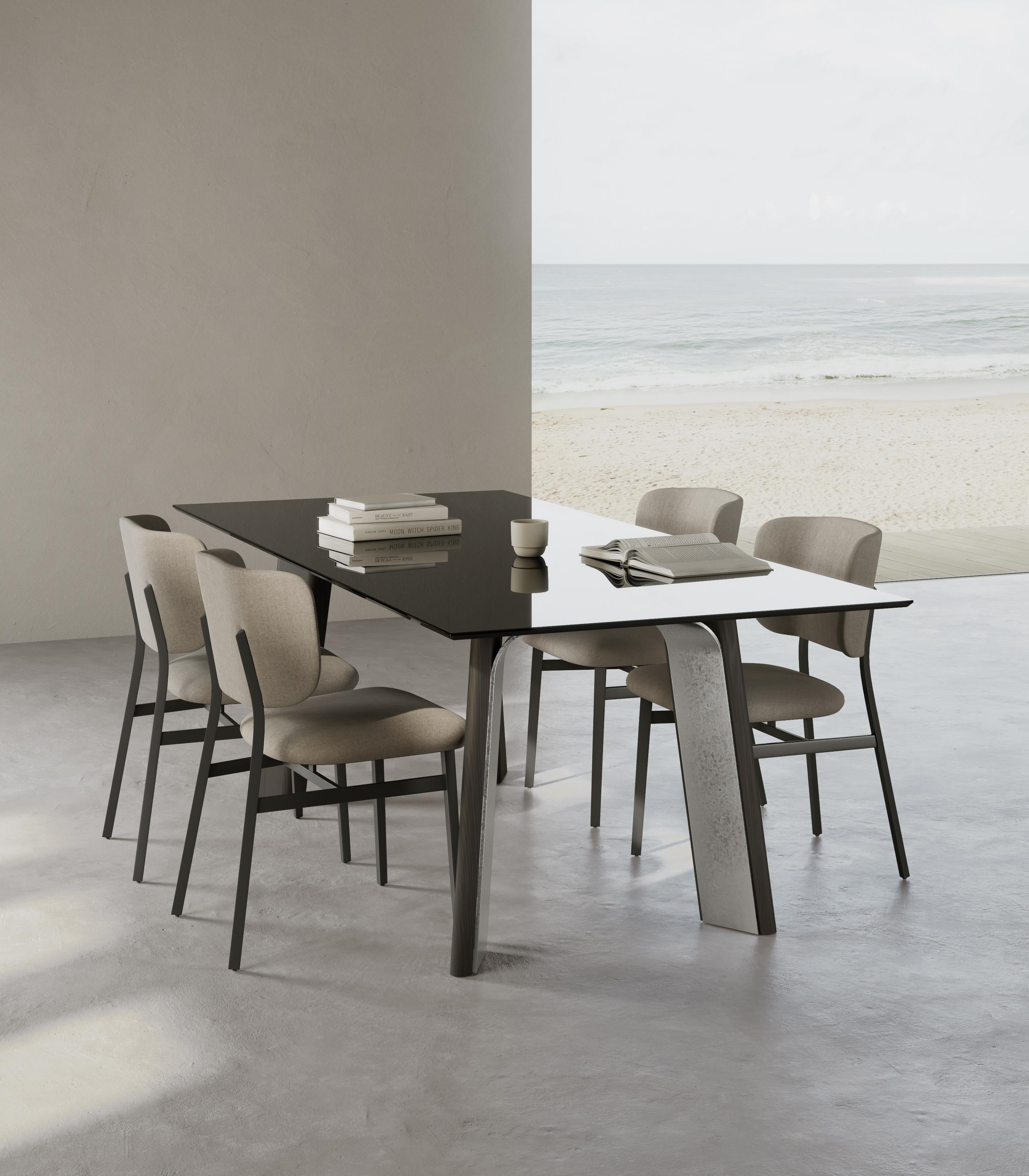 Afrodite Dining Table by Chinellato Design
Dimensions: W 200 / 220 / 250 x D 100 / 120 x H 72.2 cm
Materials: 
Top:  Smooth Smoked Tempered Glass
Base: Smoked Grey Oak / Silver Chabin


Chinellato has been operating in furnishing since 1969. In that