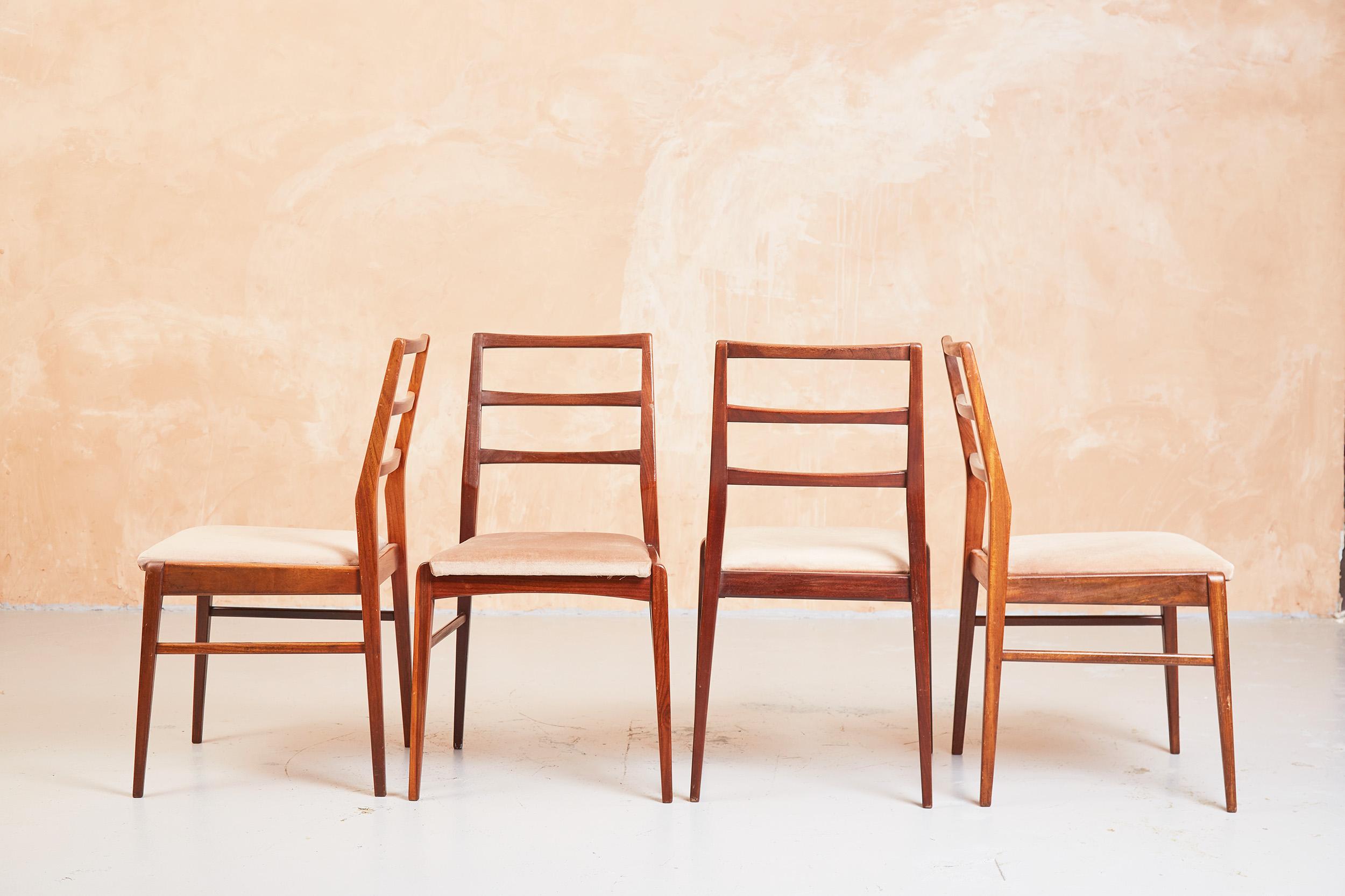 A set of four British mid century afromosia ladderback dining chairs by Richard Hornby for Fyne Ladye, retailed through Heals.

Produced in the 1960s in Banbury, Oxfordshire.

Upholstered in original pink chenille fabric

Superb craftsmanship