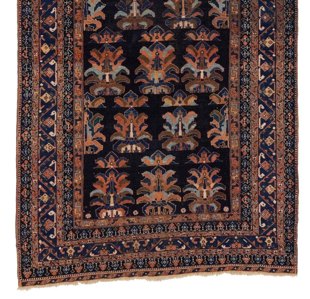 Afshar rugs are a type of handwoven rug that originated from the Afshar tribe, a nomadic group from Iran. Antique Afshar rugs are highly sought for their symbols, motifs, vibrant colors, and exceptional durability.

These rugs are known for their