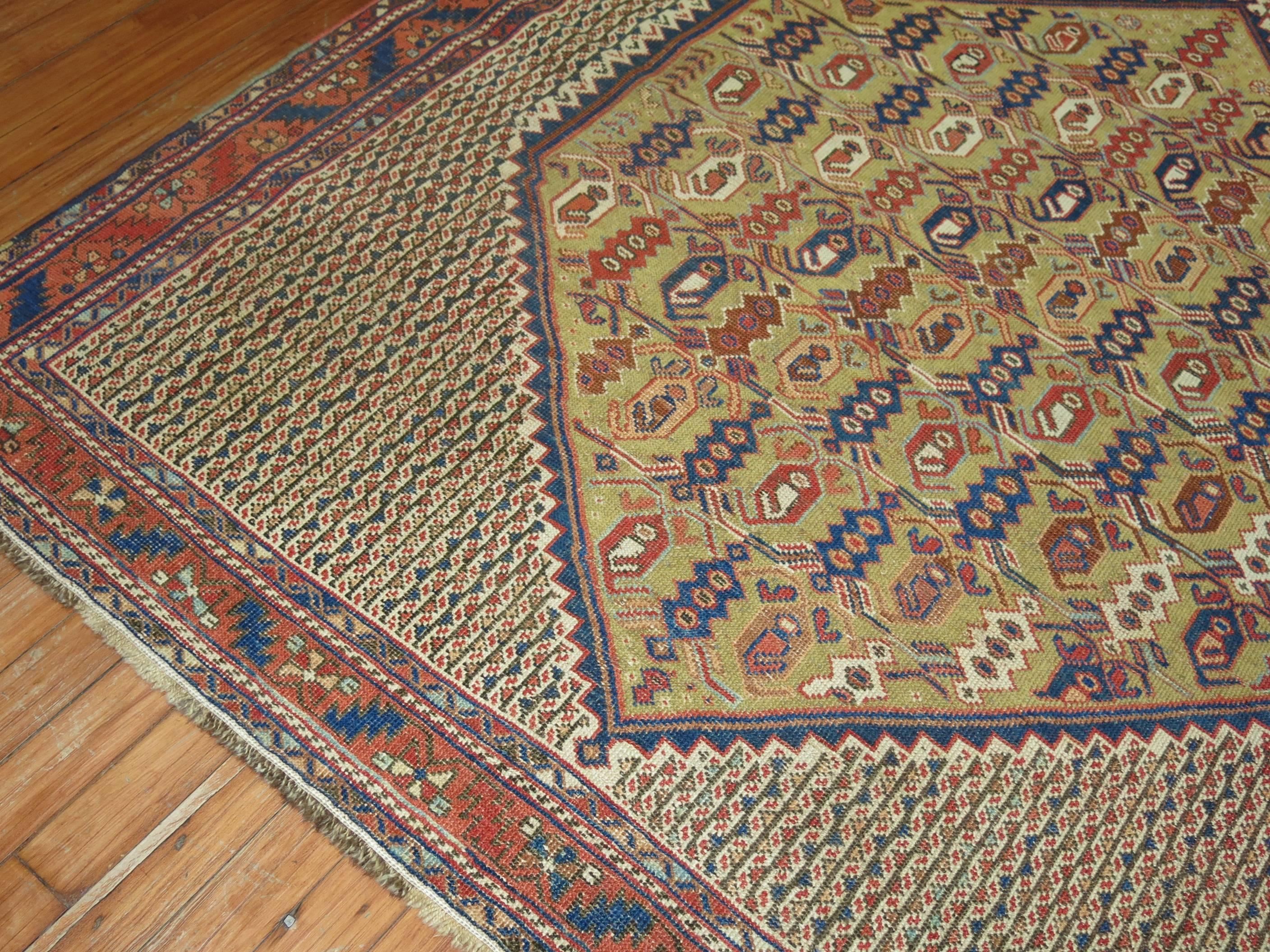 A unique rare small afshar carpet containing a boteh pattern set on a camel medallion on a striped ivory ground and rust border. Hard to find Squarish size. A great addition to anyones home or collection.

4'7'' x 5'2''