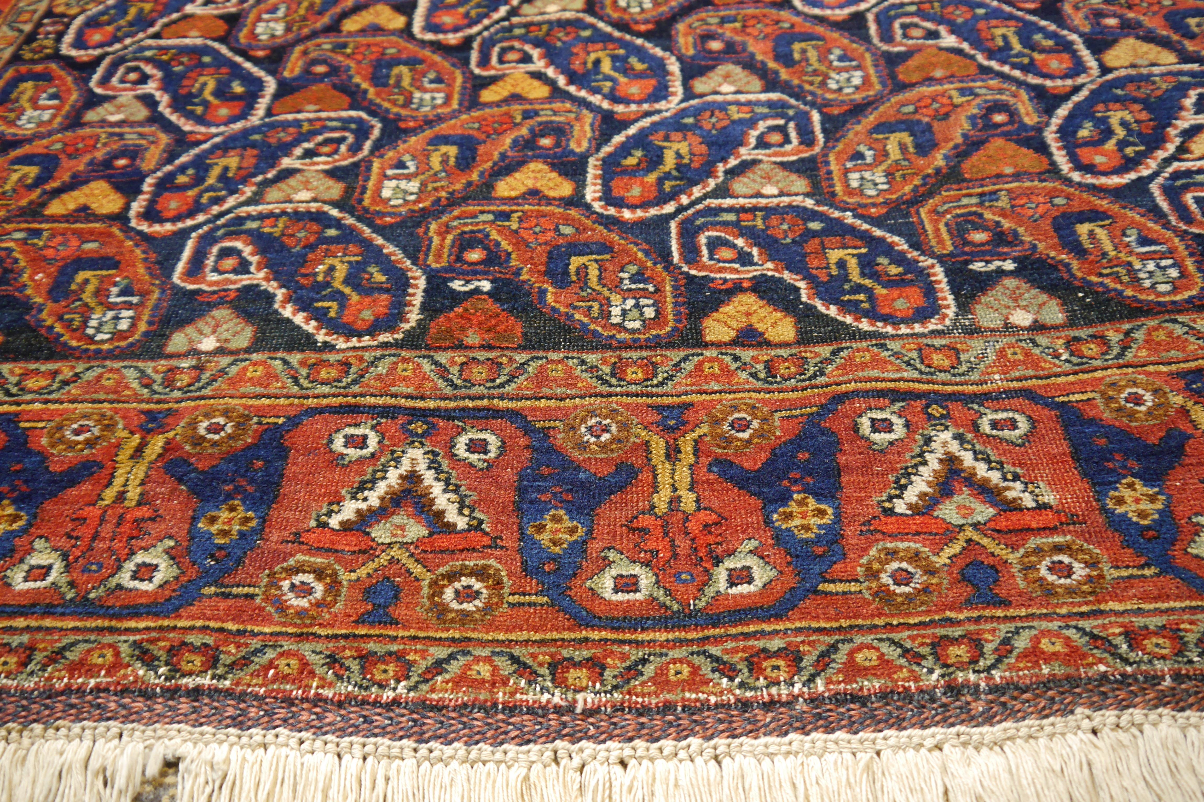Wool Afshari antique rug  6.8 x 4.8 ft natural color Bothe design blue rust For Sale