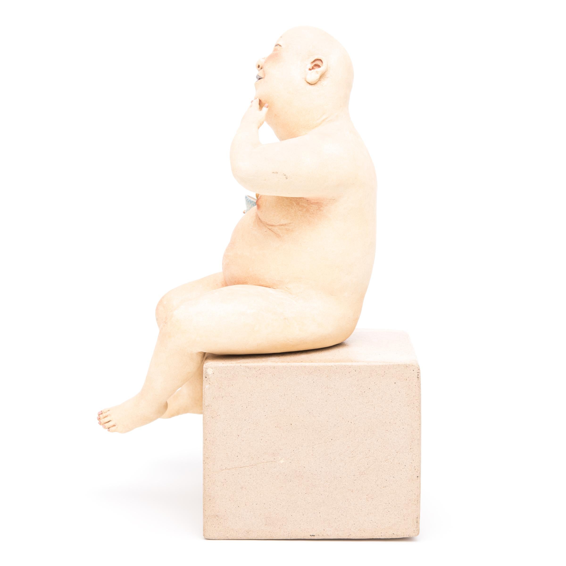 Bald and chunky, Esther Shimazu’s quirky clay figures are unabashedly naked and delightfully indulgent. Drawing upon her Japanese ancestry and experience living in a laid-back Asian community in Hawaii, the artist imbues her figures with a