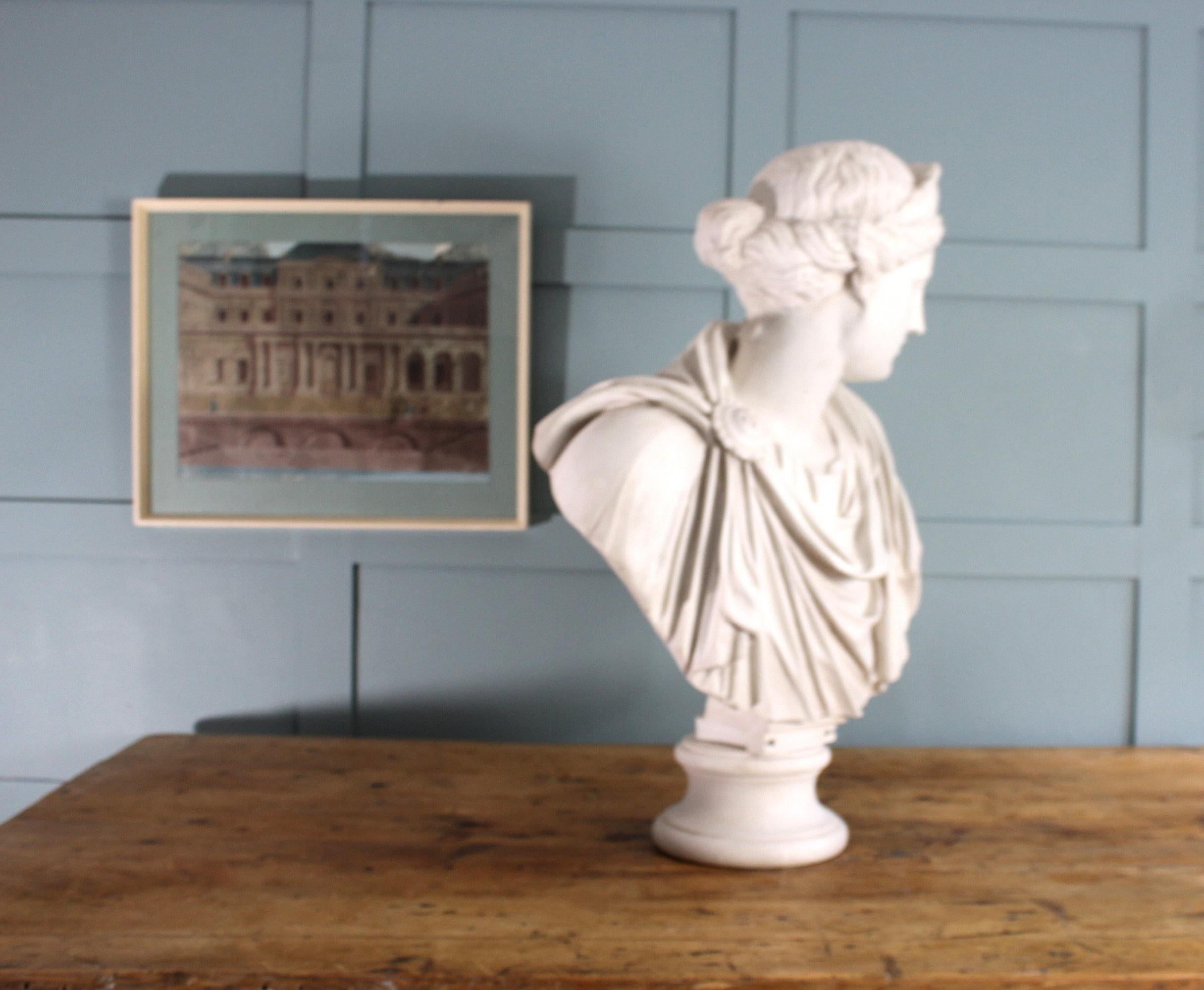 Dopo l'antico busto in marmo vintage di Anthony Redmile

Questo squisito busto in marmo After the Antique Vintage di Anthony Redmile raffigura una regale imperatrice romana avvolta in una toga tradizionale, che riflette la grandezza imperiale e
