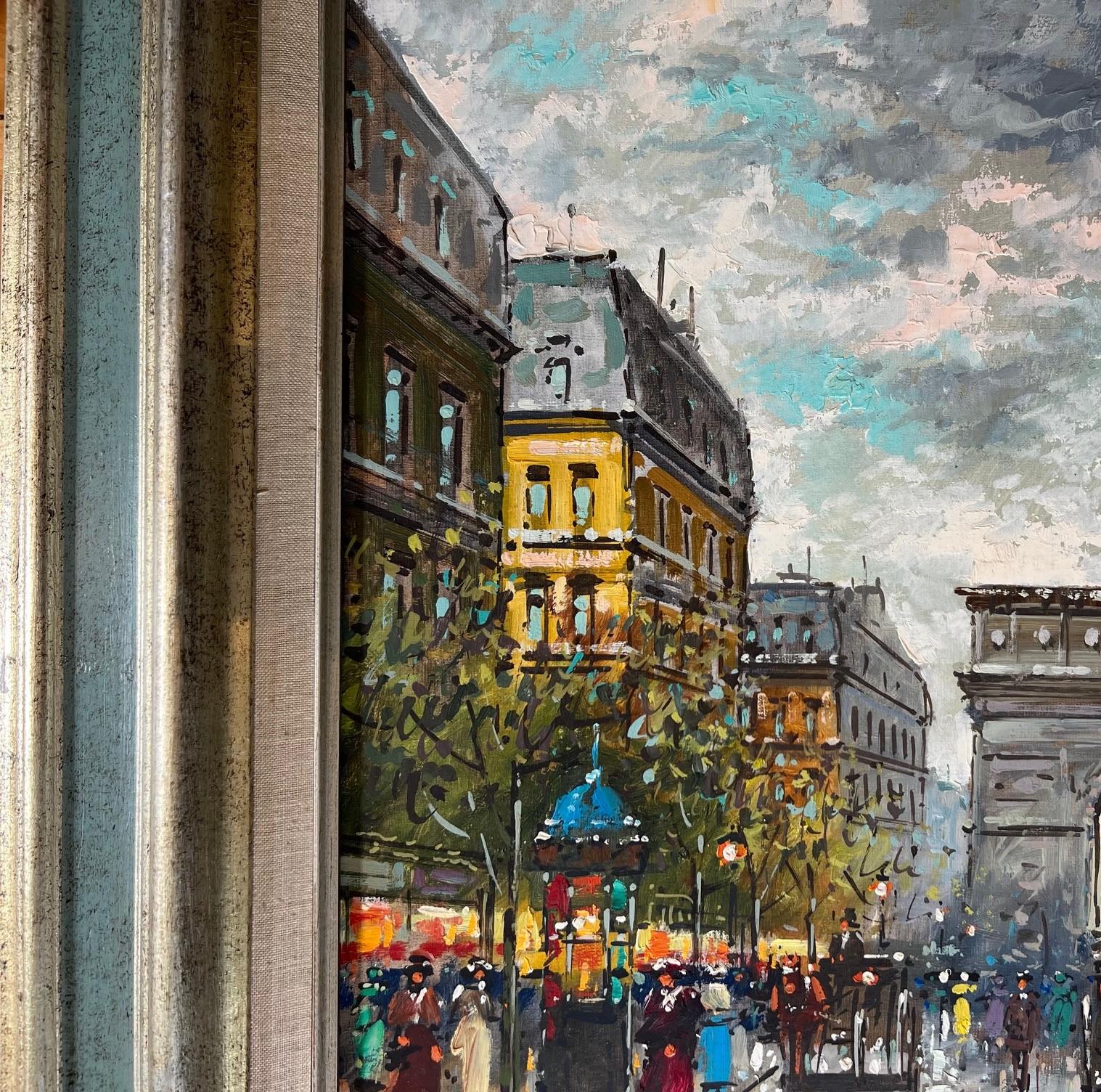 Late 20th C. framed oil on canvas. The painting represents a view down the Champs-Élysées with the Arc de Triomphe as the central focal point. The vibrant activity of carriages, trams, and pedestrians captures the daily life of the era in a highly