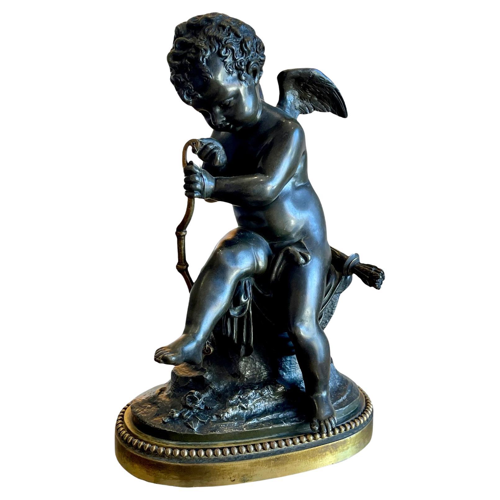 After Charles Gabriel Sauvage - Bronze, Cupid Tendant His Bow For Sale