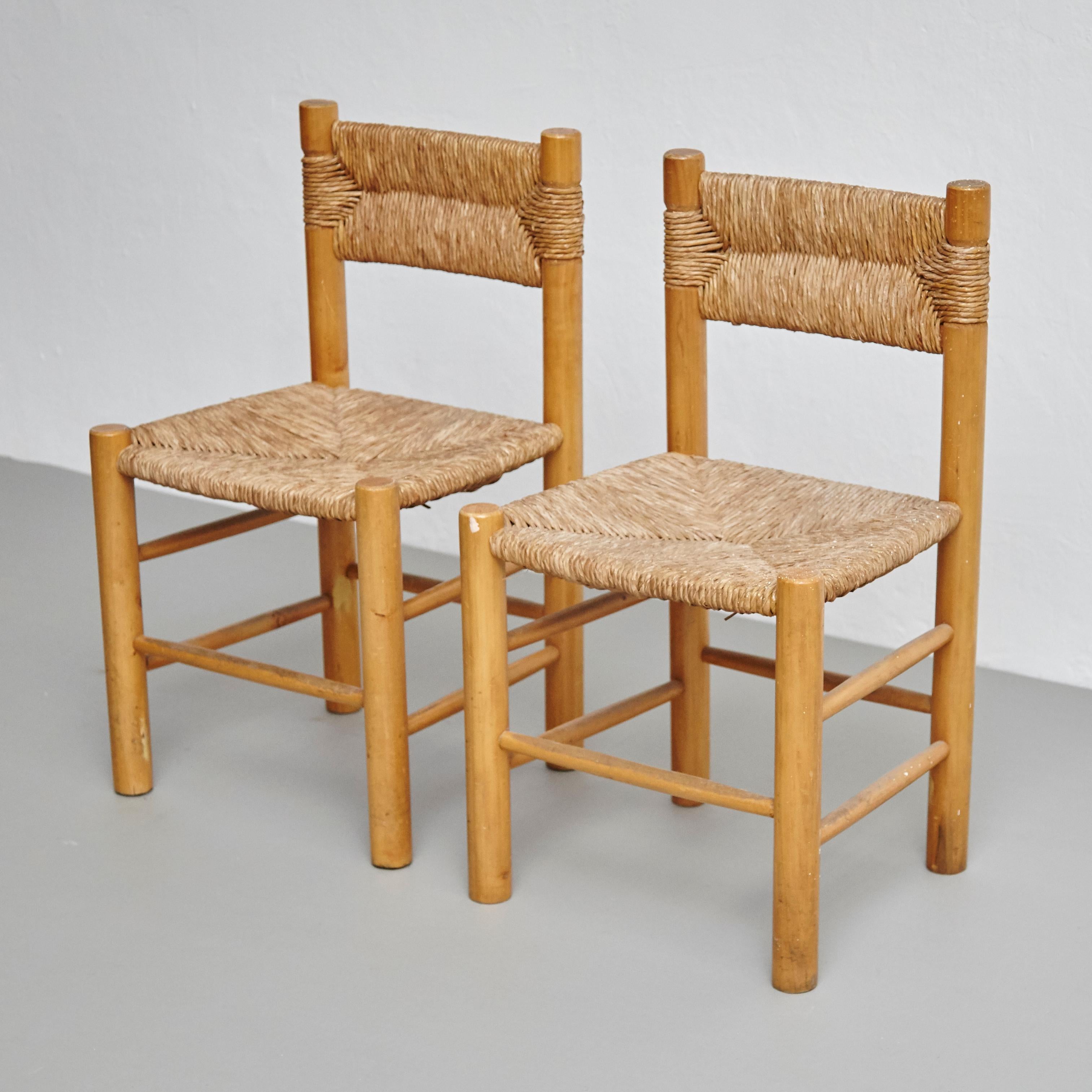After Charlotte Perriand Mid-Century Modern Rattan Pair of Chairs, circa 1950 In Good Condition In Barcelona, Barcelona