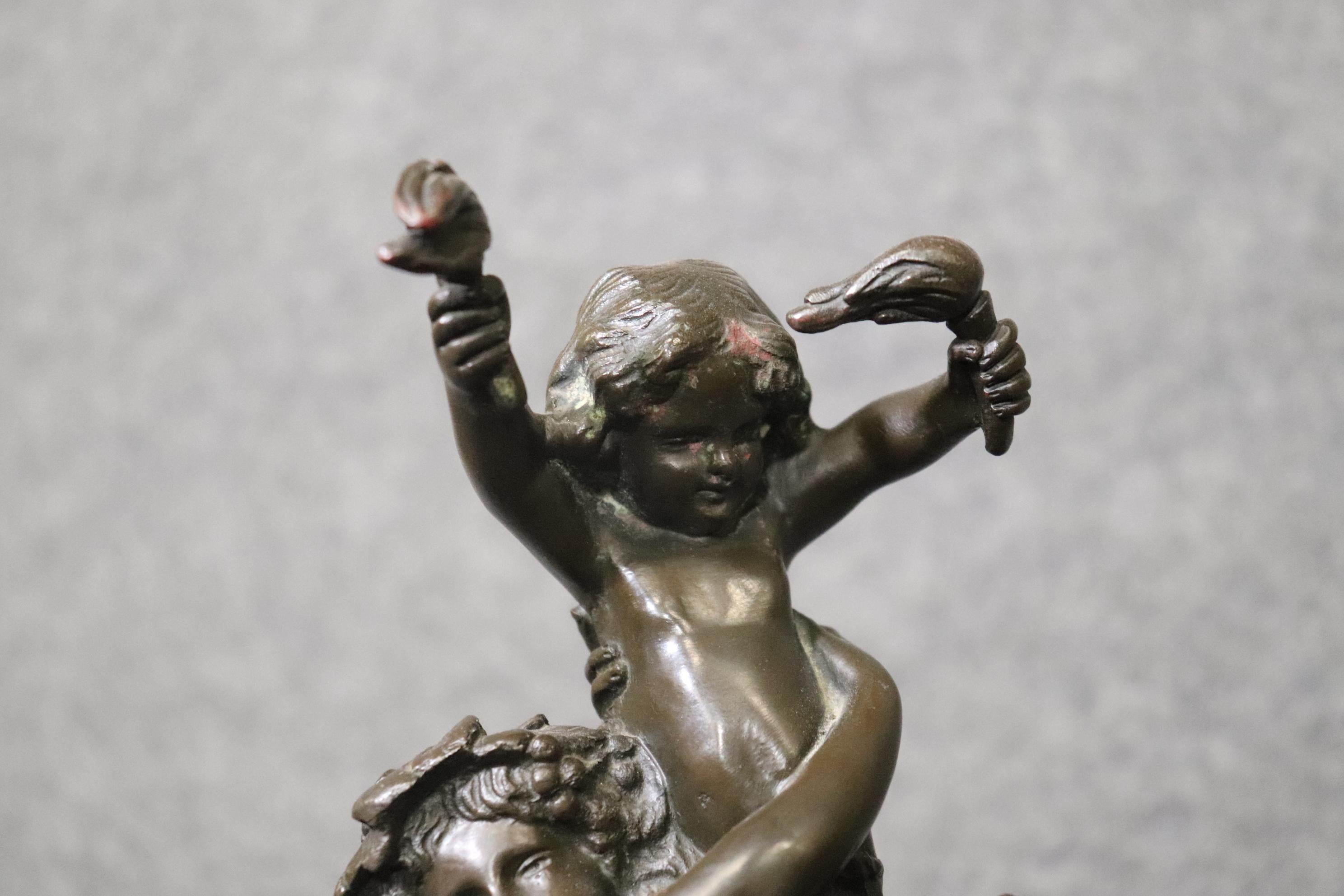 Bronze Sculpture en bronze signée de Clodion intitulée « Bacchae and Cupidon ».  en vente