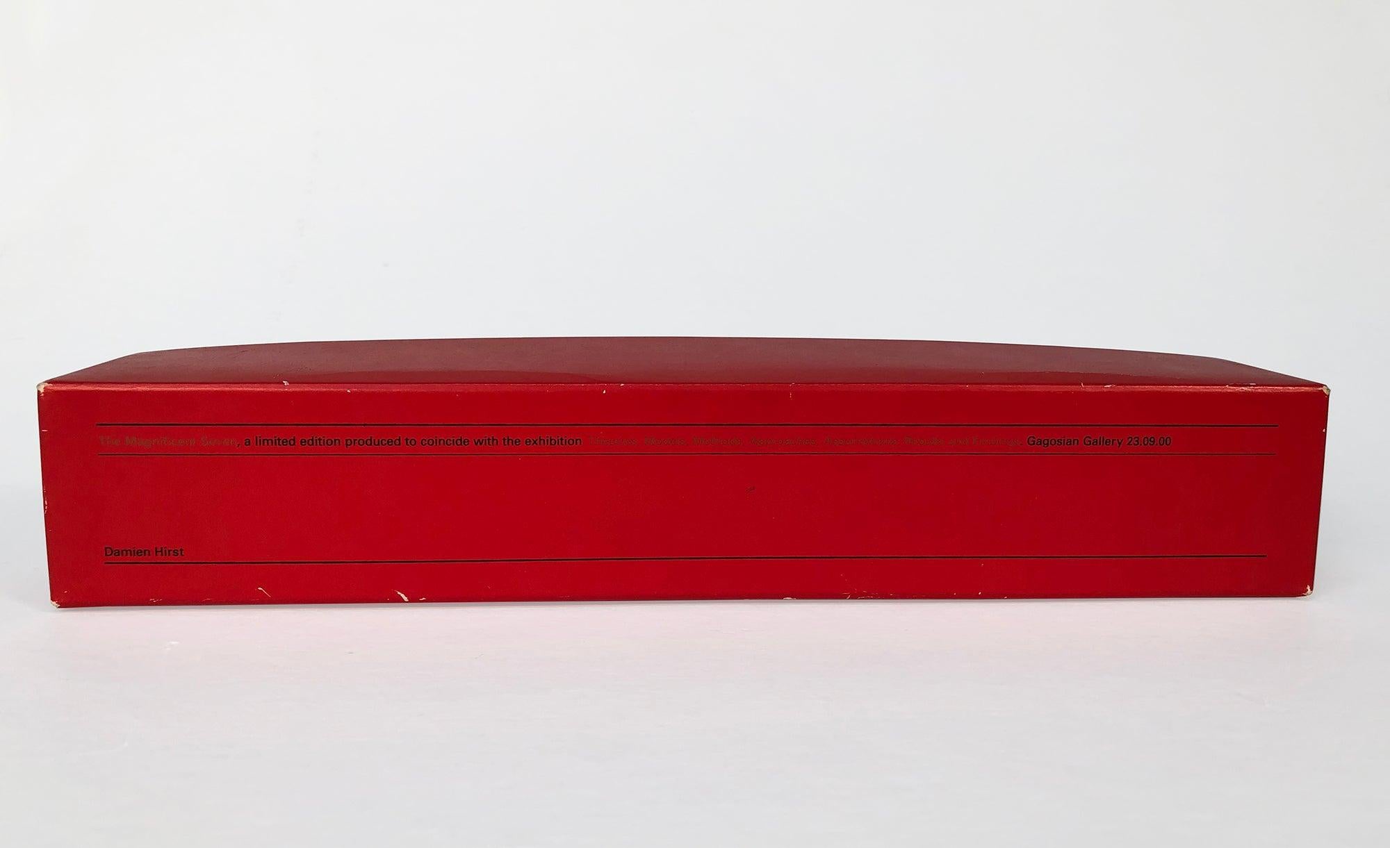 This unique set comprises seven ping pong balls, housed in their original cardboard box. Measuring 60 x 338 x 60 mm (2 3/8 x 13 1/4 x 2 3/8 inches), this collectible edition is a limited run of 1500 pieces. Each box is signed by the artist in black