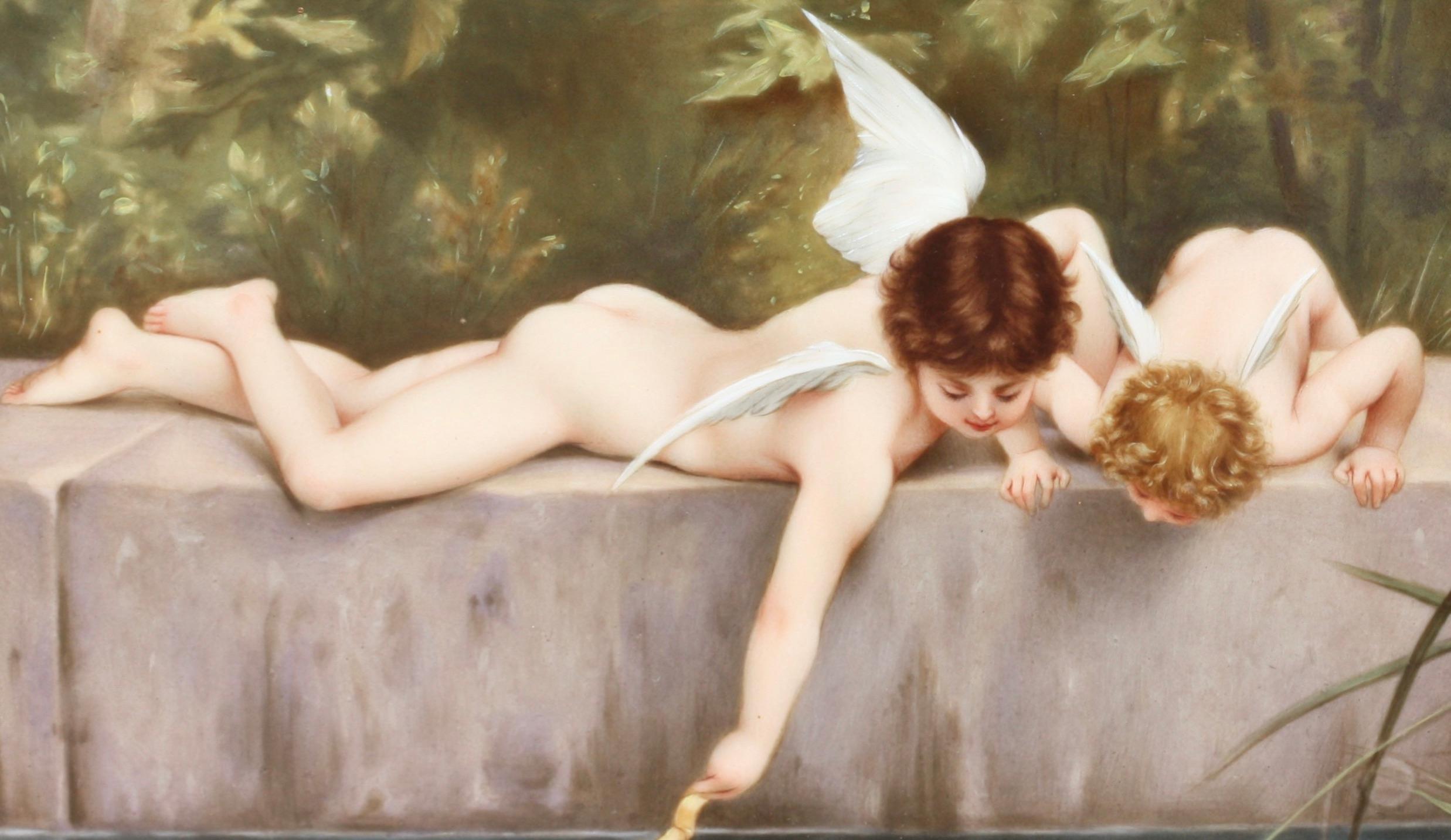 After Émile Munier (1810-circa 1895)
'Fischend Amor'
A Berlin (K.P.M.) Porcelain plaque, circa 1880
painted with cupid and another putto using his bow to fish his quiver of arrows from a pond, within a red velvet and giltwood frame.
Impressed to
