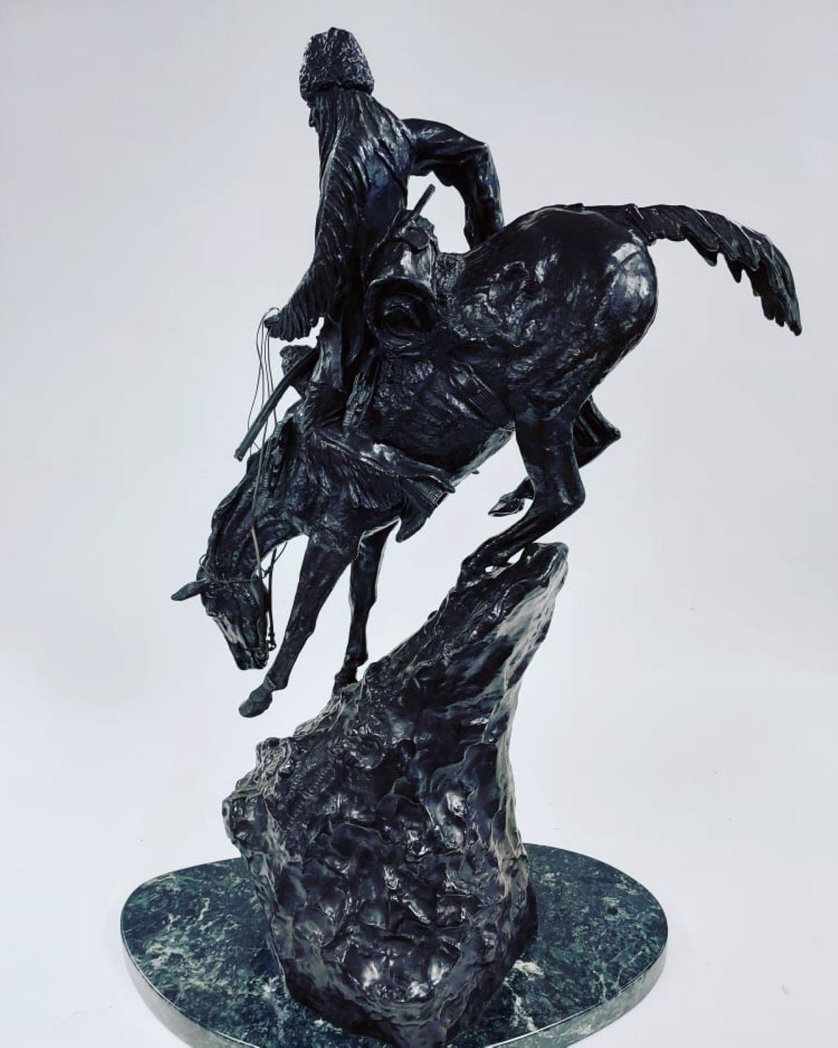 (after) Frederic Remington Figurative Sculpture - The Mountain Man After Frederick Remington 