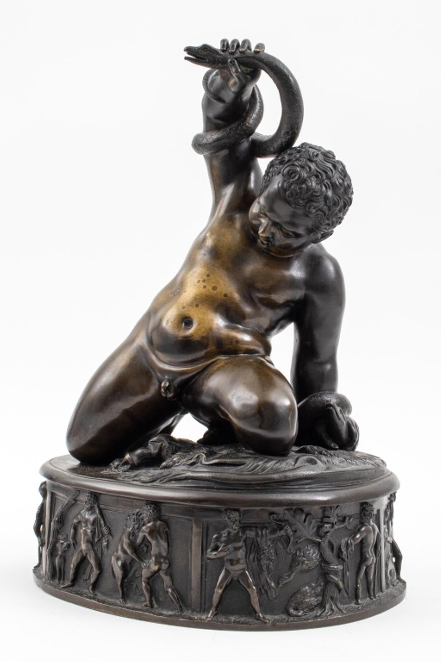 Hercules fighting a serpent atop the Nemean lion skin, mounted on a pedestal with frieze scenes of Hercules's labors, early to mid nineteenth century. In very good vintage condition.

Dealer: S138XX
