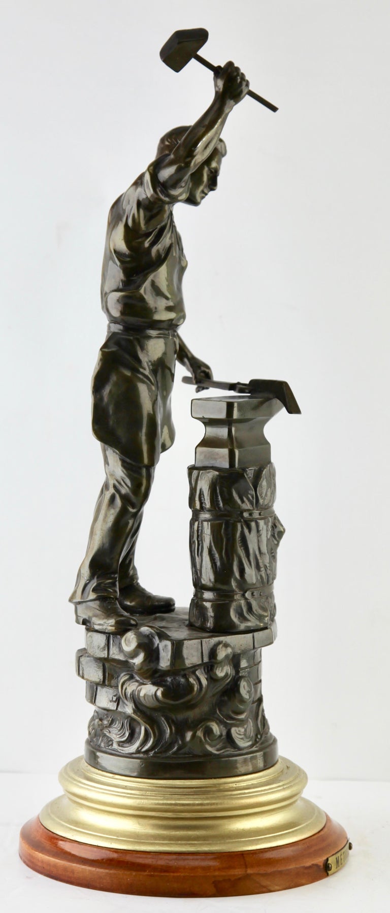 Hand-Crafted After J Becox Statue of a Young Blacksmith, French Spelter For Sale