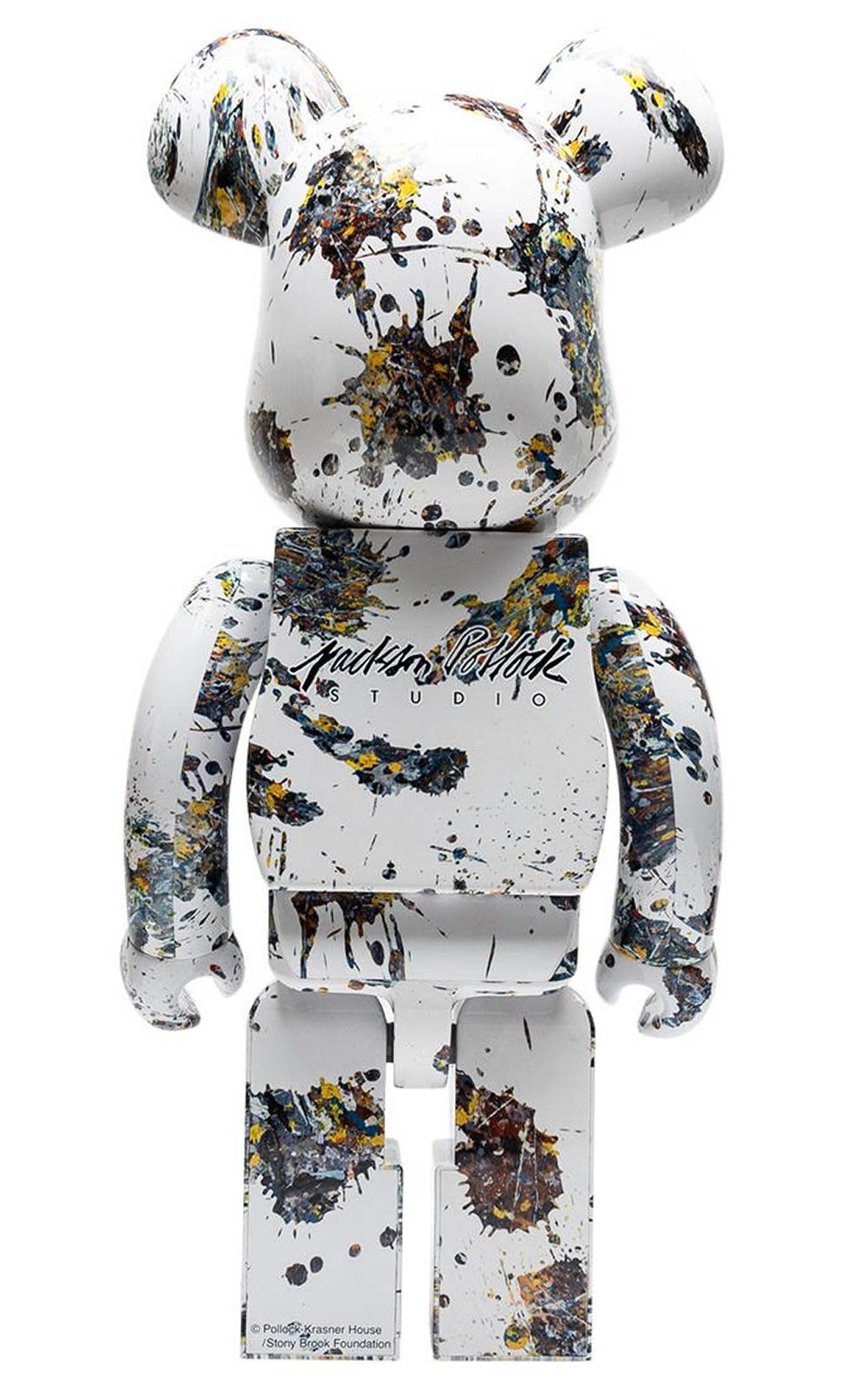 Jackson Pollock 1000% Bearbrick Figurative Sculpture: 
A nicely sized (27 inch heigh), highly collectible Bearbrick Jackson Pollock statue piece, splattered from head to toe in Pollock’s signature art; includes a recreation of the artist’s signature