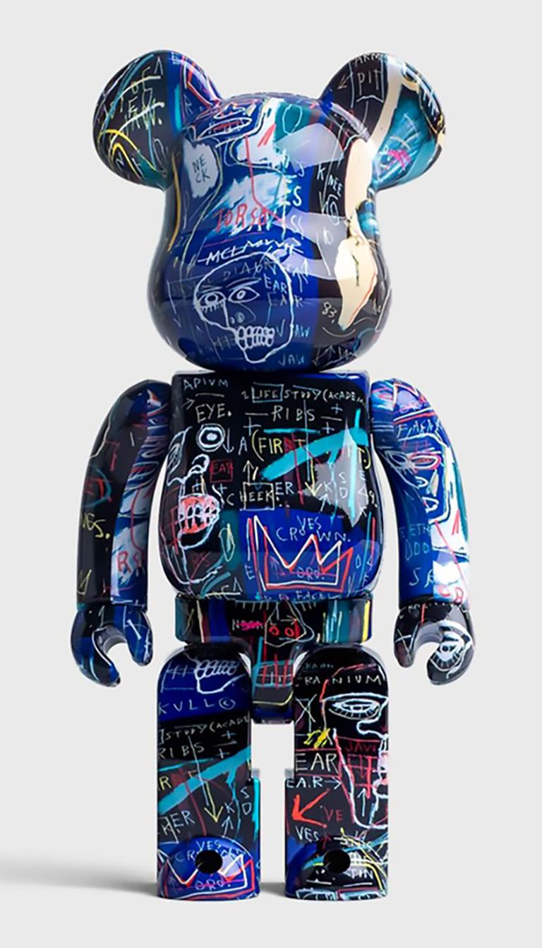 Jean-Michel Basquiat 1000% Bearbrick Vinyl Figure: 
A nicely sized (27 inch), highly collectible Bearbrick Basquiat statue piece, trademarked & licensed by the Estate of Jean-Michel Basquiat. The partnered collectible reveals the late iconic