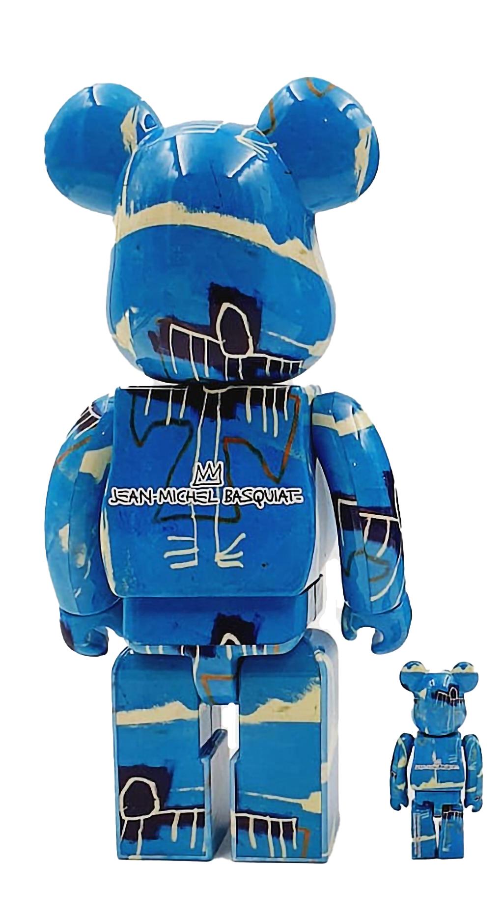Be@rbrick x Estate of Jean-Michel Basquiat Vinyl Figures: Set of two (400% & 100%):
A unique, timeless limited edition Basquiat collectible trademarked & licensed by the Estate of Jean-Michel Basquiat. The partnered collectible reveals details from