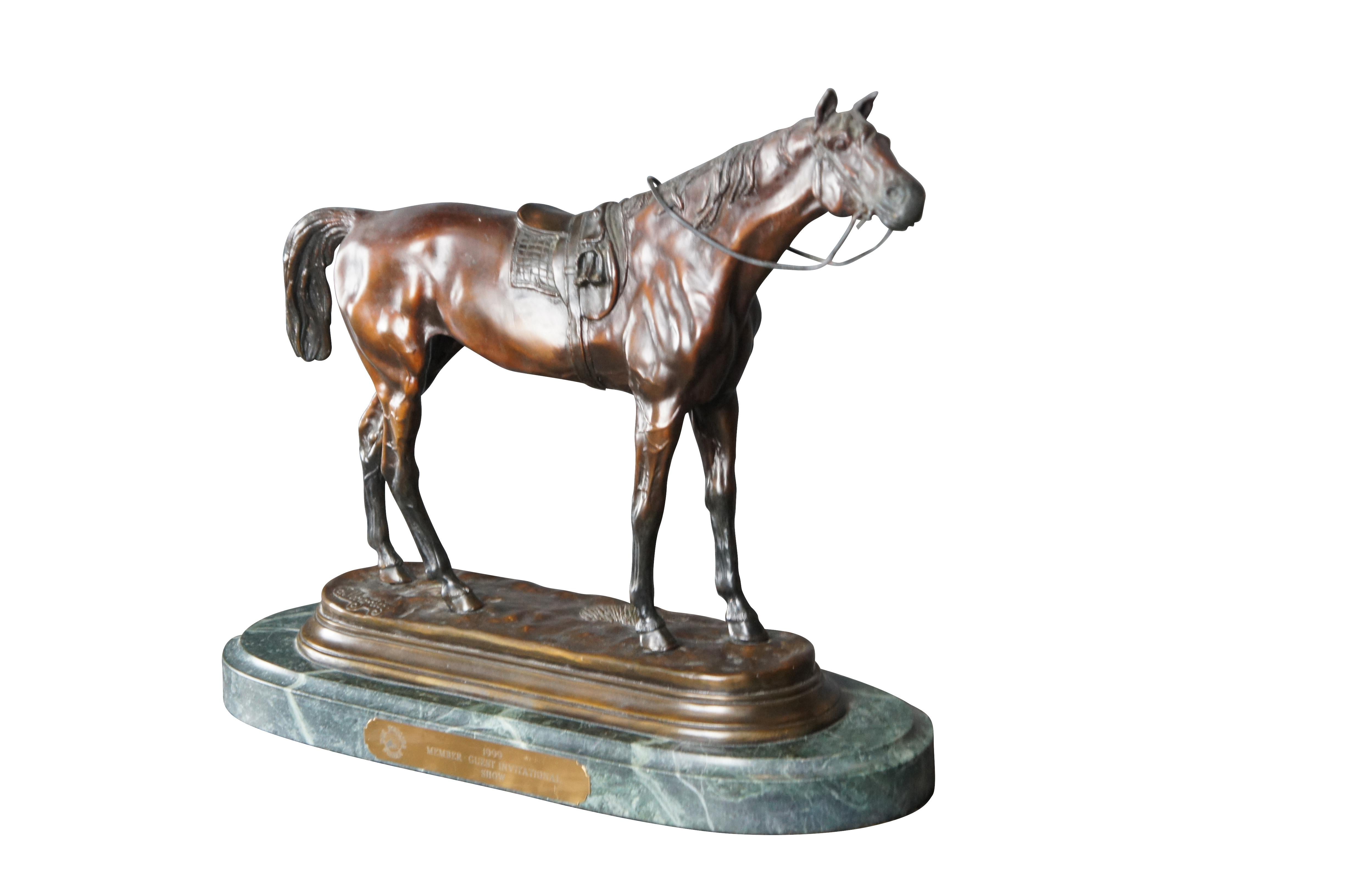 20th Century bronze depicting a saddled race horse. After Jules Moigniez (French, 1835-1894). Signed along the top by the hind legs. The bronze is mounted to a oval green plinth base. Originally used as a trophy for the 1999 Member Guest