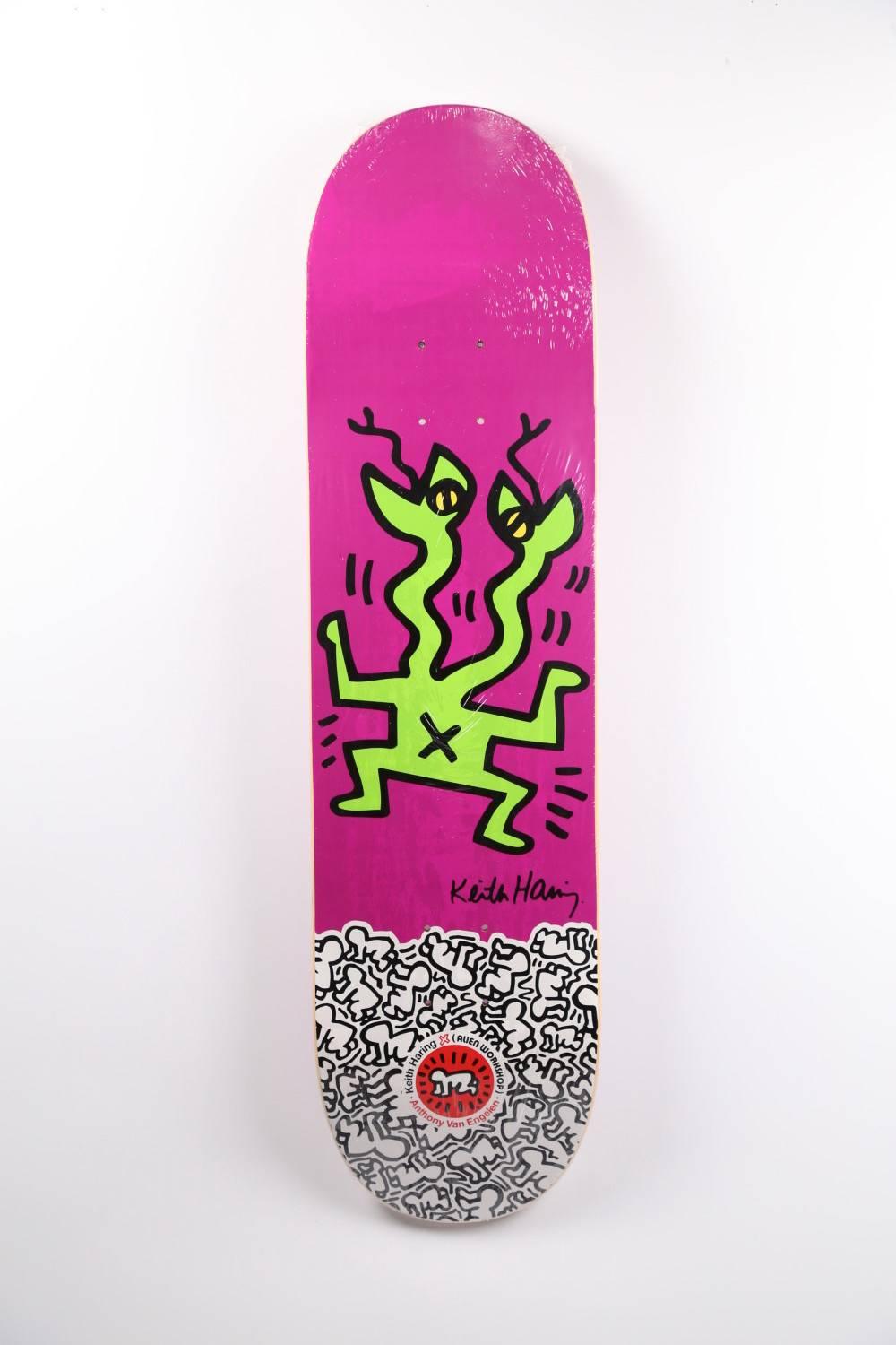 Keith Haring Skateboard Deck (New)
Extremely rare, out of print Keith Haring skate deck featuring one of the Haring's iconic lizard image, set amidst a brilliant array of colors. This work originated circa 2012 as a result of the collaboration