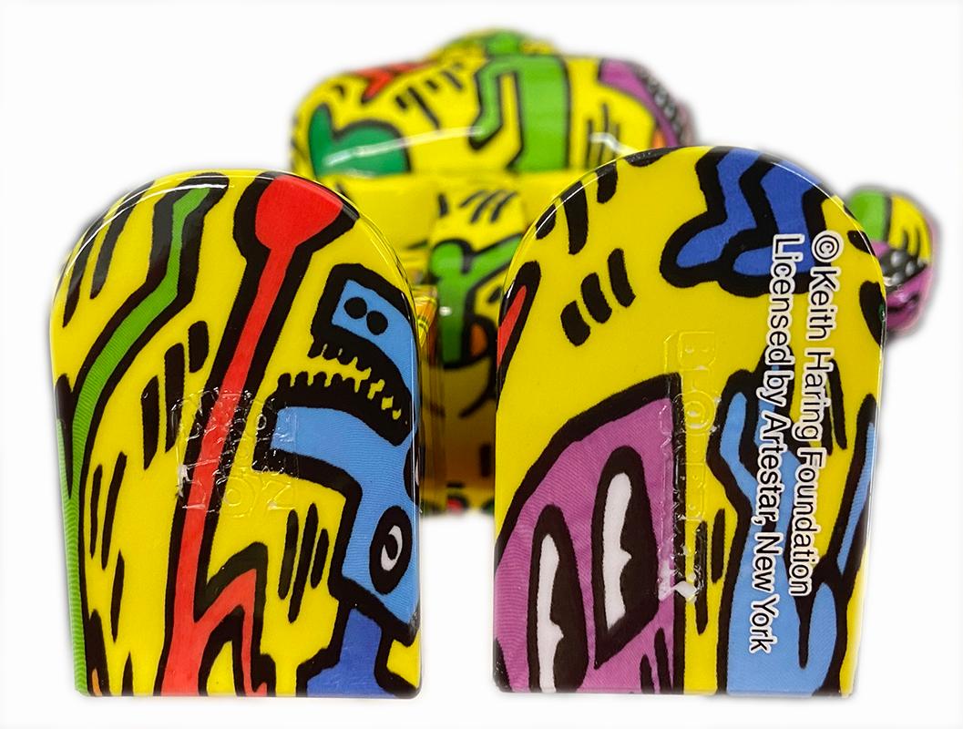 Keith Haring Bearbrick Vinyl Figures: Set of two (400% & 100%):
A unique, timeless collectible trademarked & licensed by the Estate of Keith Haring. The partnered collectible reveals the late iconic artist’s artwork from the mid 1980s wrapping the