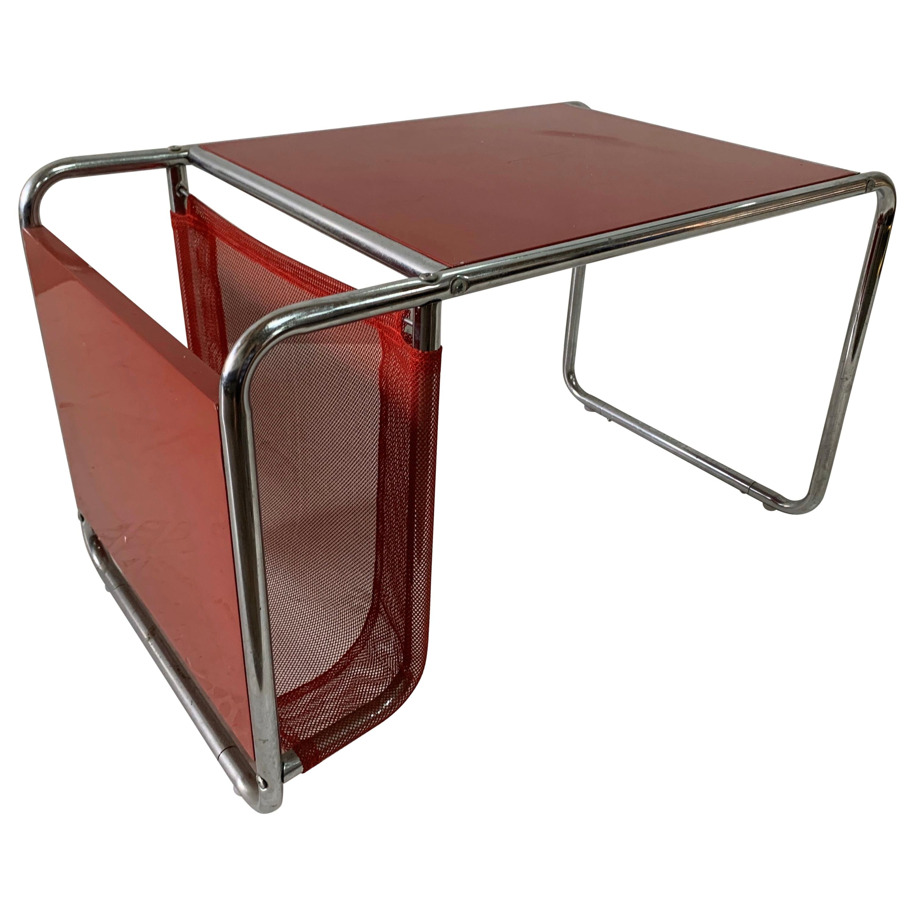 After Marcel Breuer, a Bauhaus Style Side Table and Magazine Holder For Sale