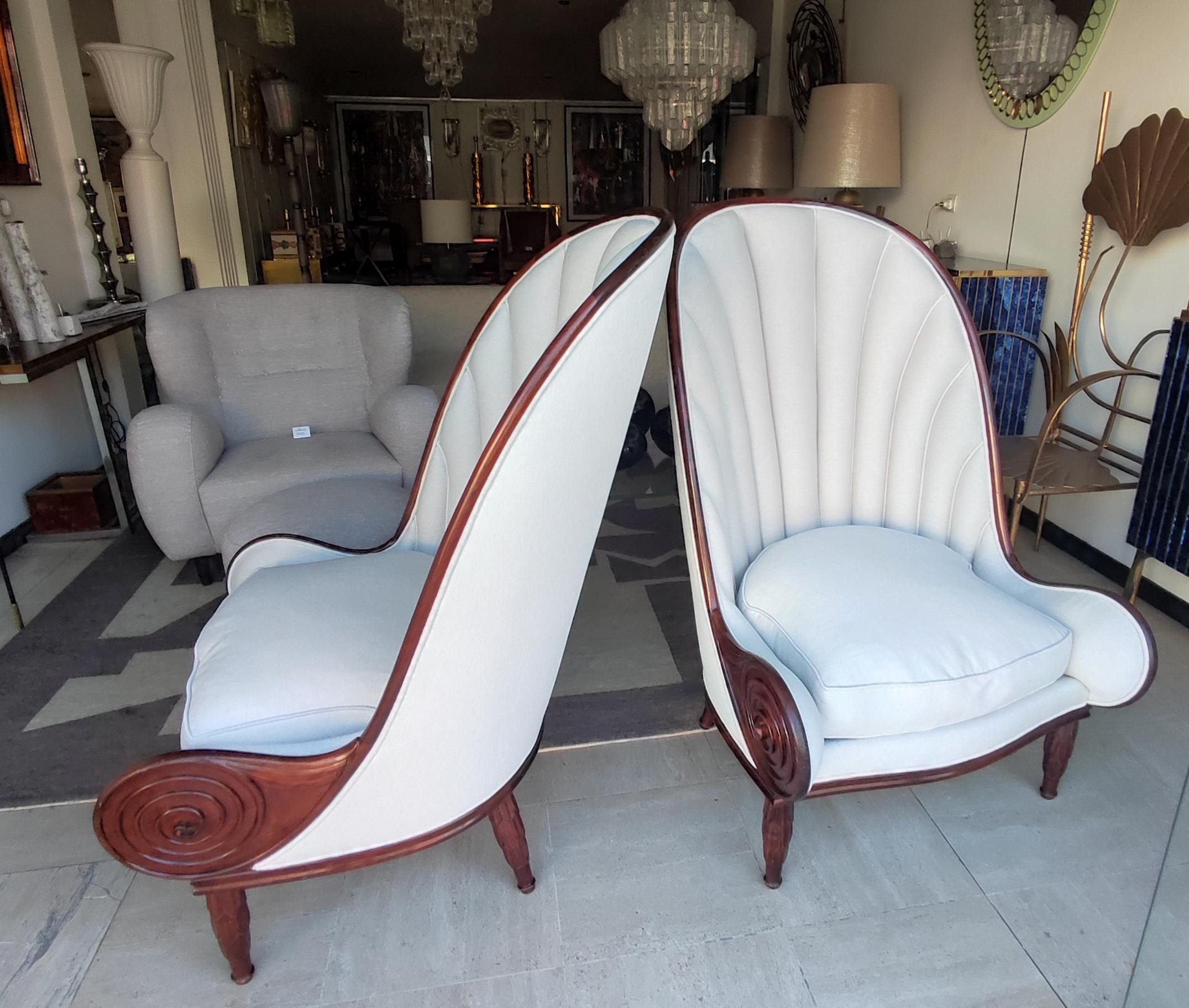 After Paul Iribe, circa 70'' fantastic pair of Nautile armchairs,in wallnut tree reupholsterd with Pierre Frey fabric.