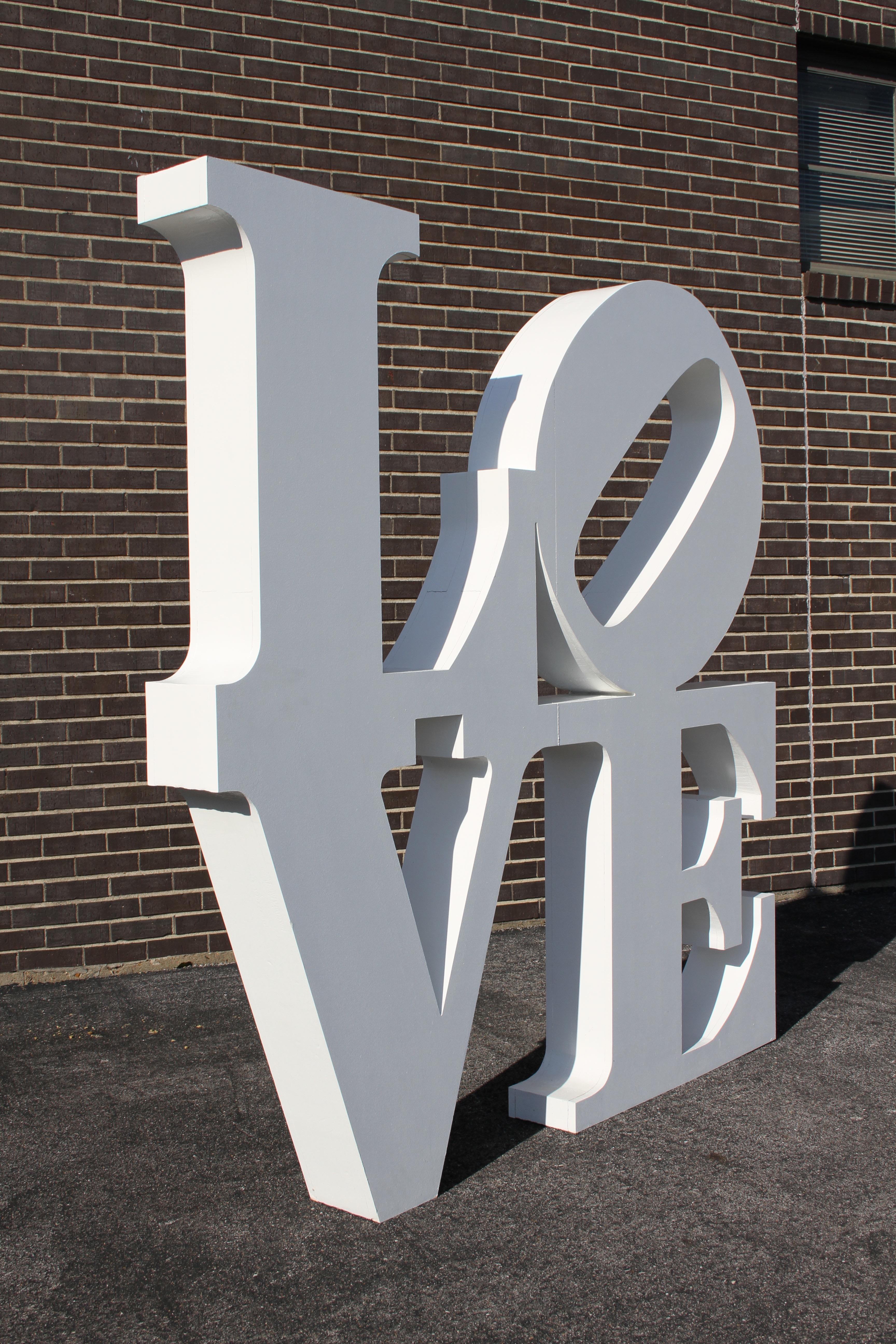 After Robert Indiana iconic large 6' x 6' LOVE pop art sculpture. This sculpture was custom-made for a wedding, can be used as art in a home, display for a store or a prop. It is made of MDF on the outside and rigid foam on the inside. It has been