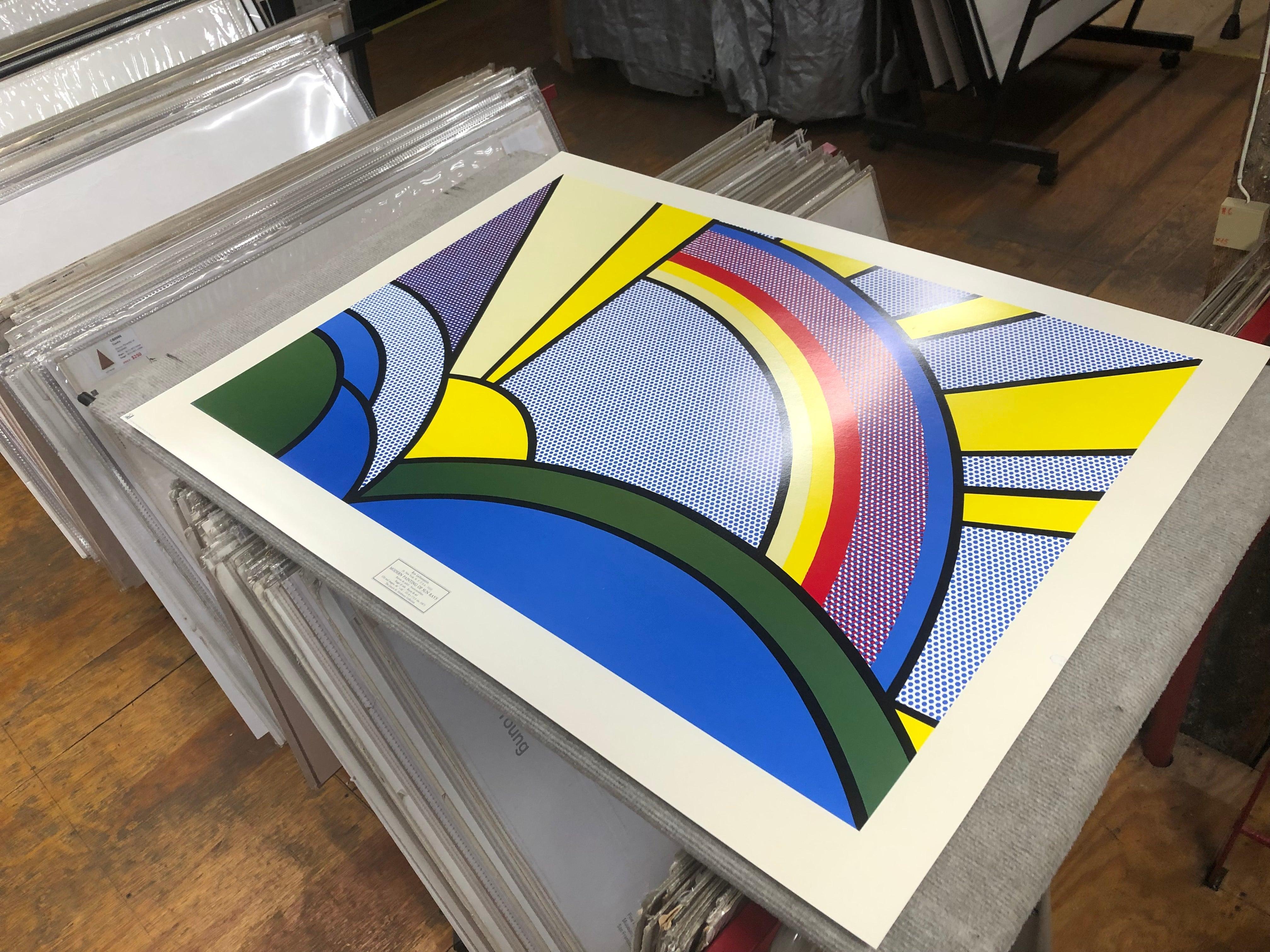Esta serigrafía mecánica original de la Pintura moderna de rayos de sol de Lichtenstein fue publicada por la New York Graphic Society en 1972. Capturando el estilo vibrante e icónico de Lichtenstein, esta pieza refleja su enfoque innovador del Arte