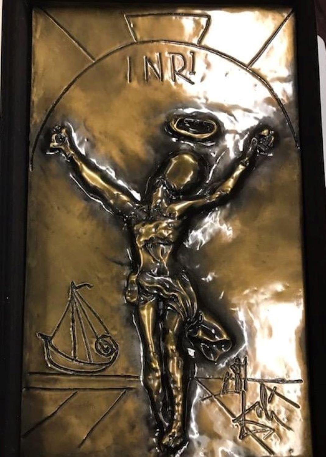 Salvador Dali BAS Relief Sculpture Gold Edition, Signed Dali Sculpture. Signed  E65/75. 
Christ Of St. John Of The Cross, a base relief sculpture by Salvador Dali with a Gold finish depicting crucifixion image of Christ with INRI above head and a
