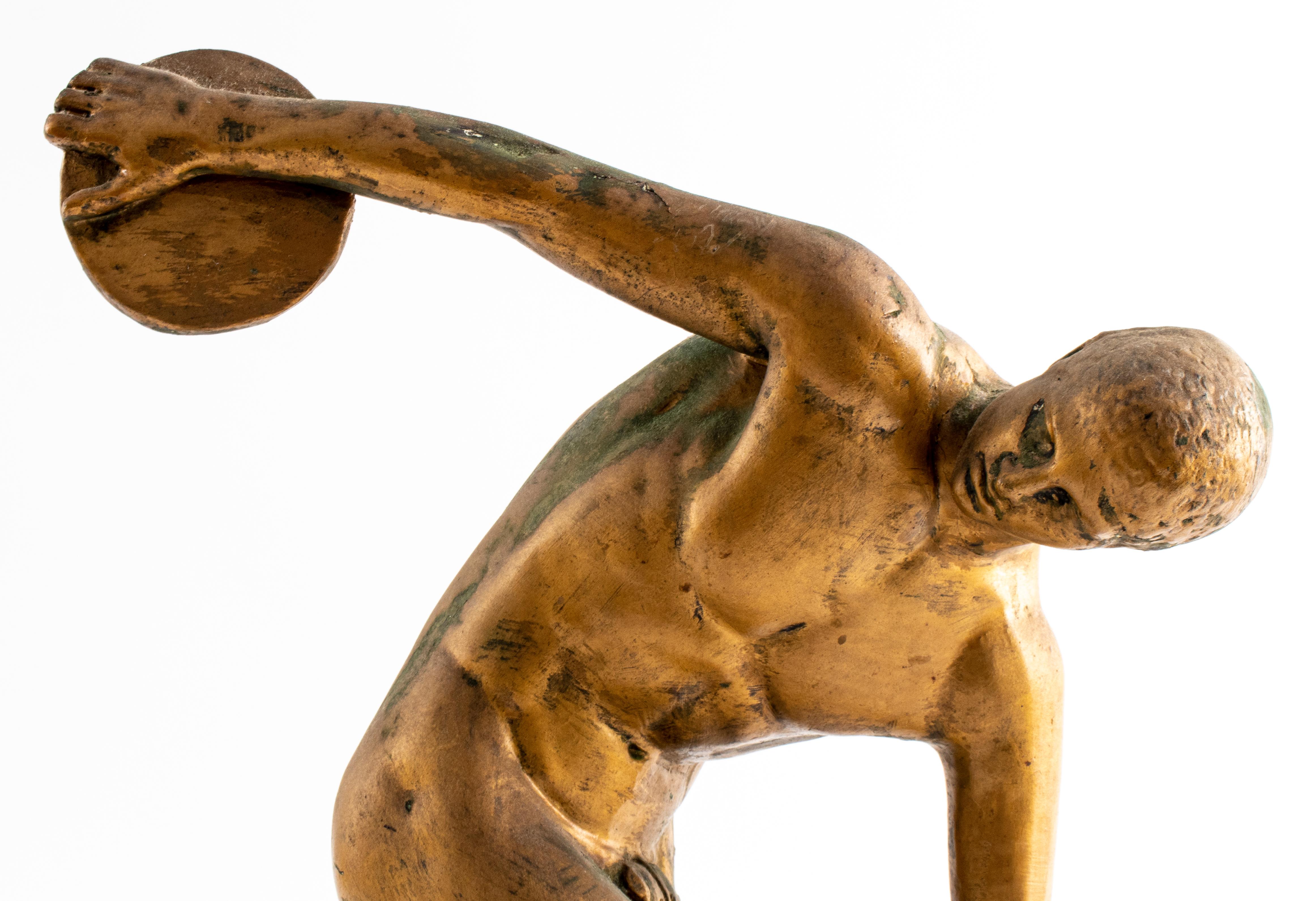 Gilt plaster figure of a discus thrower, after the Ancient Greek 