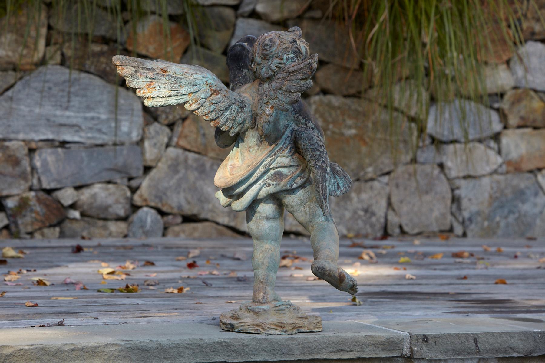Mid-20th Century After Verrocchio, Detailed Bronze Water Garden Statue of Cherub and Fish, 1940s