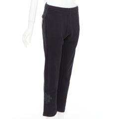 A&G JAPAN black cotton logo print silver Dagger zip sweat pants XS