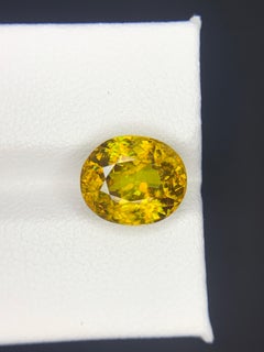 Sfene / Titanite naturale sfusa effetto fuoco da 5,49 carati certificata AGA