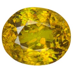 Sfene / Titanite naturale sfusa effetto fuoco da 5,49 carati certificata AGA