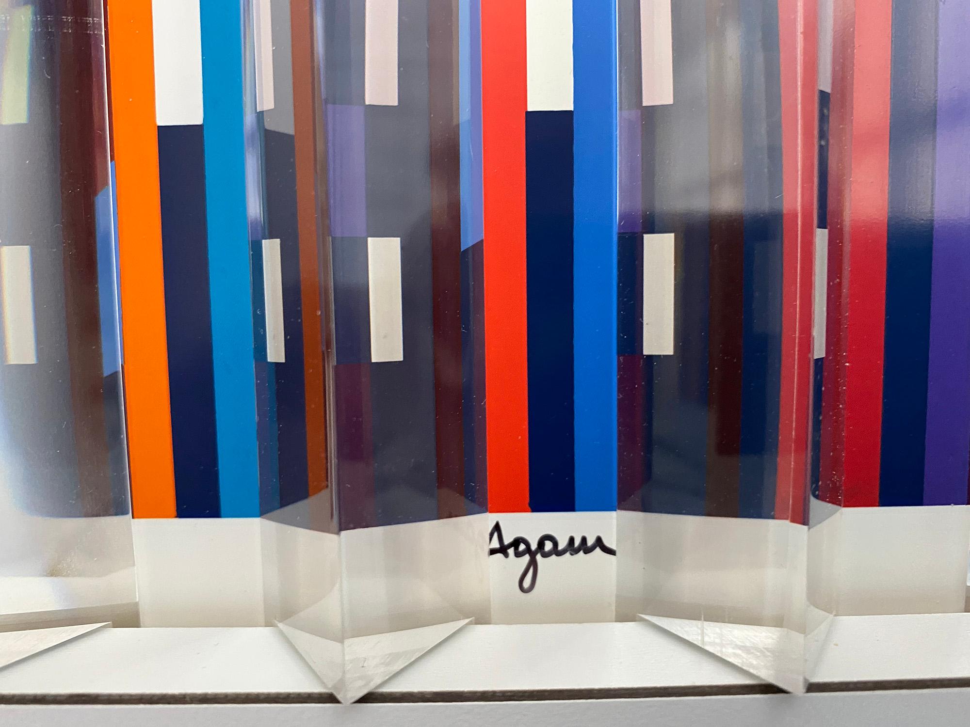 This piece by Yaacov Agam is an artist’s proof, 1 of 6 that was created by Duke Zimmerman from Zimmerman Editions in 1990, and who is the original printer of the series. The series was printed as the result of the approval by Agam of this proof. The