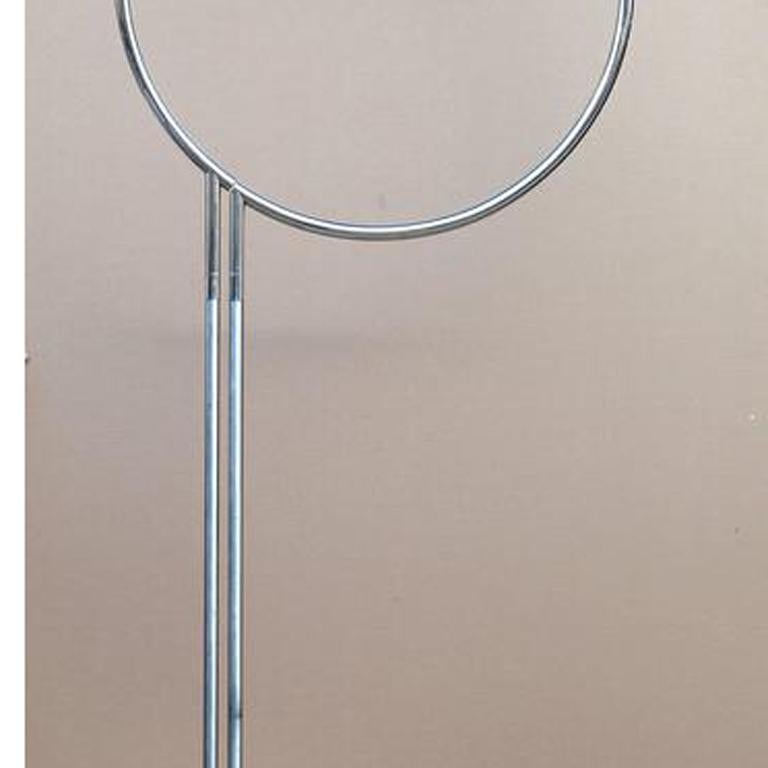 Artist: Yaacov Agam, Israeli (1928 - )
Title: Cercle Haut
Year: 1968/69 
Medium: Unique Chrome and Steel Kinetic Sculpture
Size: 85  x 35  x 2 in. (215.9  x 88.9  x 5.08 cm)
Base: 9 x 17.5 x 17.5 inches
Reference: Popper 261-265
