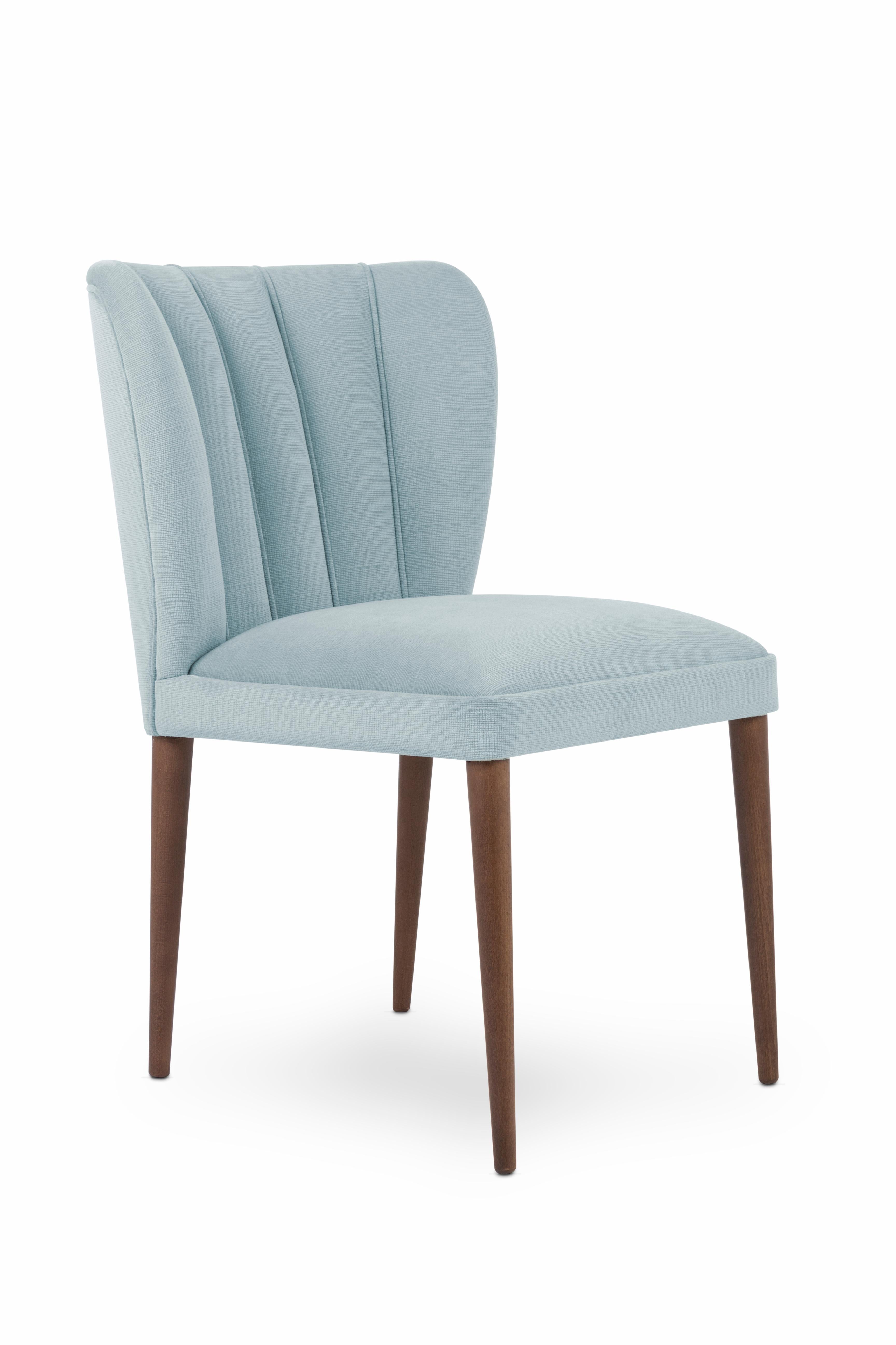 42kg foam.

With a unique shell-shaped interior, the Agata chair is the perfect combination of comfort and class!

This contemporary chair with ash/beech feet with a stain finish is a charming addition to any room and design style, especially if you