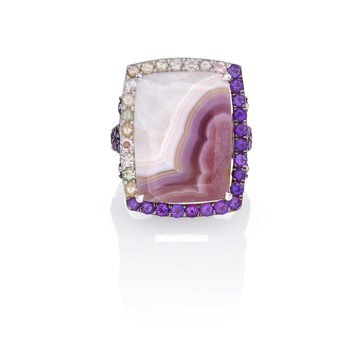 Ring in 18Kt white gold , modern, set with Agate Amethyst and Tourmaline. The abstract design of this ring was inspired by the unique mixture of stones that looks like latte coffee cream in purple!
The rare Agate stone is 15,45 ct , Amethyst and
