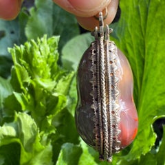 Agate and Silver-Gilt Crabs’ Eye Pendant of an Acorn. German, 17th century.