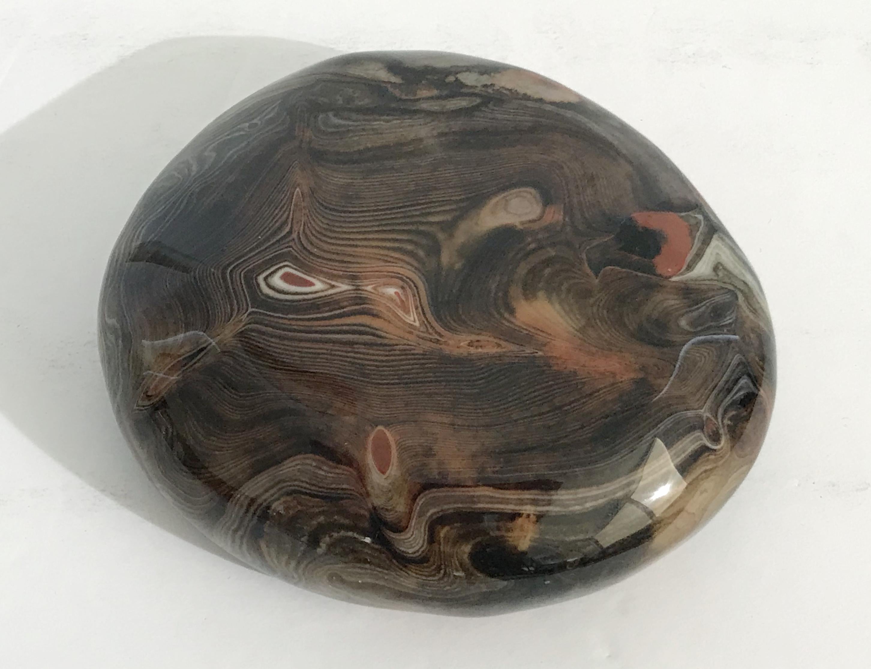 Hand polished agate onyx stone paperweight in black, brown, and red intricate layered patterns
Measures: length 5 inches, width 4.5 inches, height 1 inch
1 in stock in Palm Springs ON 50% OFF SALE for $225 !!
This piece makes for a great and unique