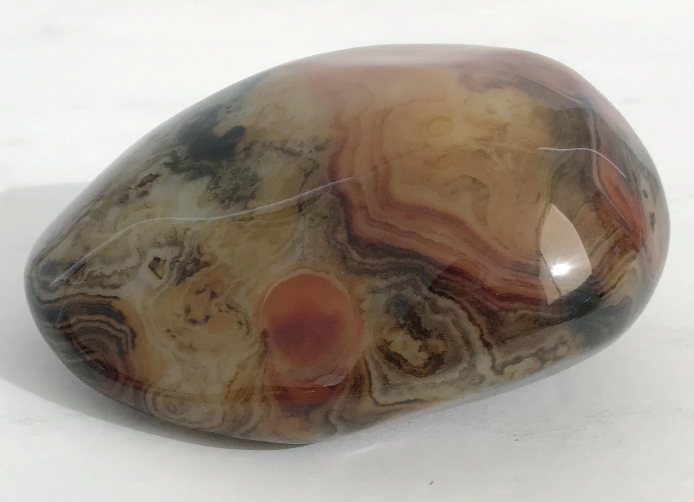 Hand polished agate onyx stone paperweight in black, brown, and red intricate layered patterns
Measures: length 5 inches, width 4 inches, height 2.25 inch
1 in stock in Palm Springs ON 50% OFF SALE for $225 !!
This piece makes for a great and unique