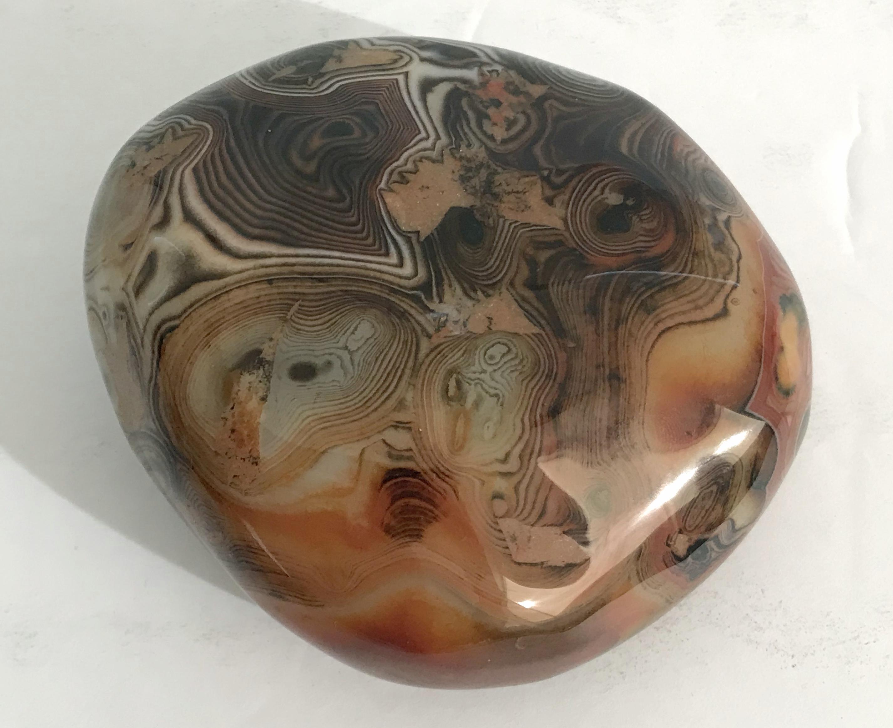 Hand polished agate onyx stone paperweight in black, brown, and red intricate layered patterns
Measures: length 4.25 inches, width 3.25 inches, height 2 inches
1 in stock in Palm Springs ON 50% OFF SALE for $225 !!
This piece makes for a great and