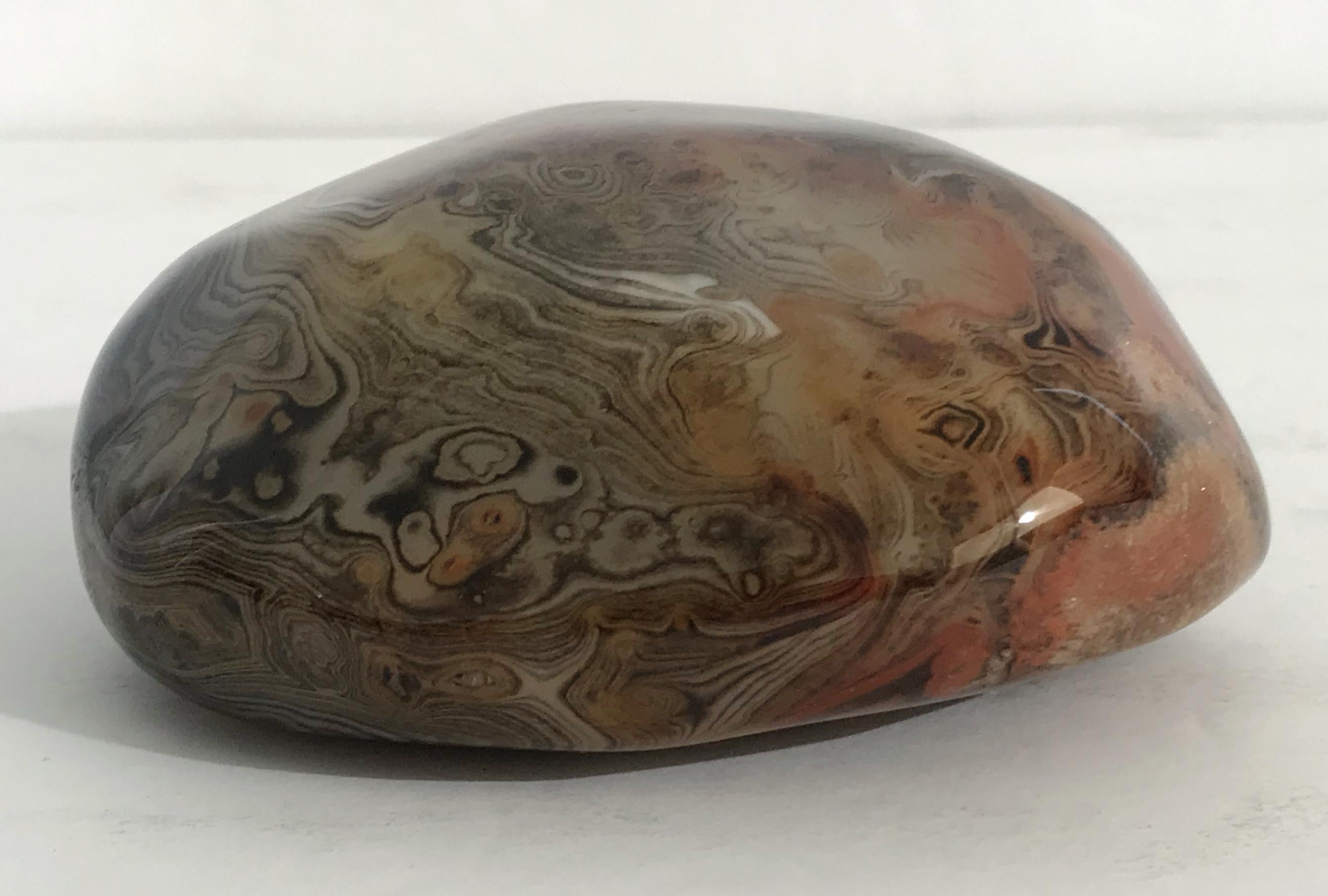 Hand polished agate onyx stone paperweight in black, brown, and red intricate layered patterns
Measures: diameter 4 inches, height 2 inches
1 in stock in Palm Springs ON 50% OFF SALE for $225 !!
This piece makes for a great and unique gift!
Order