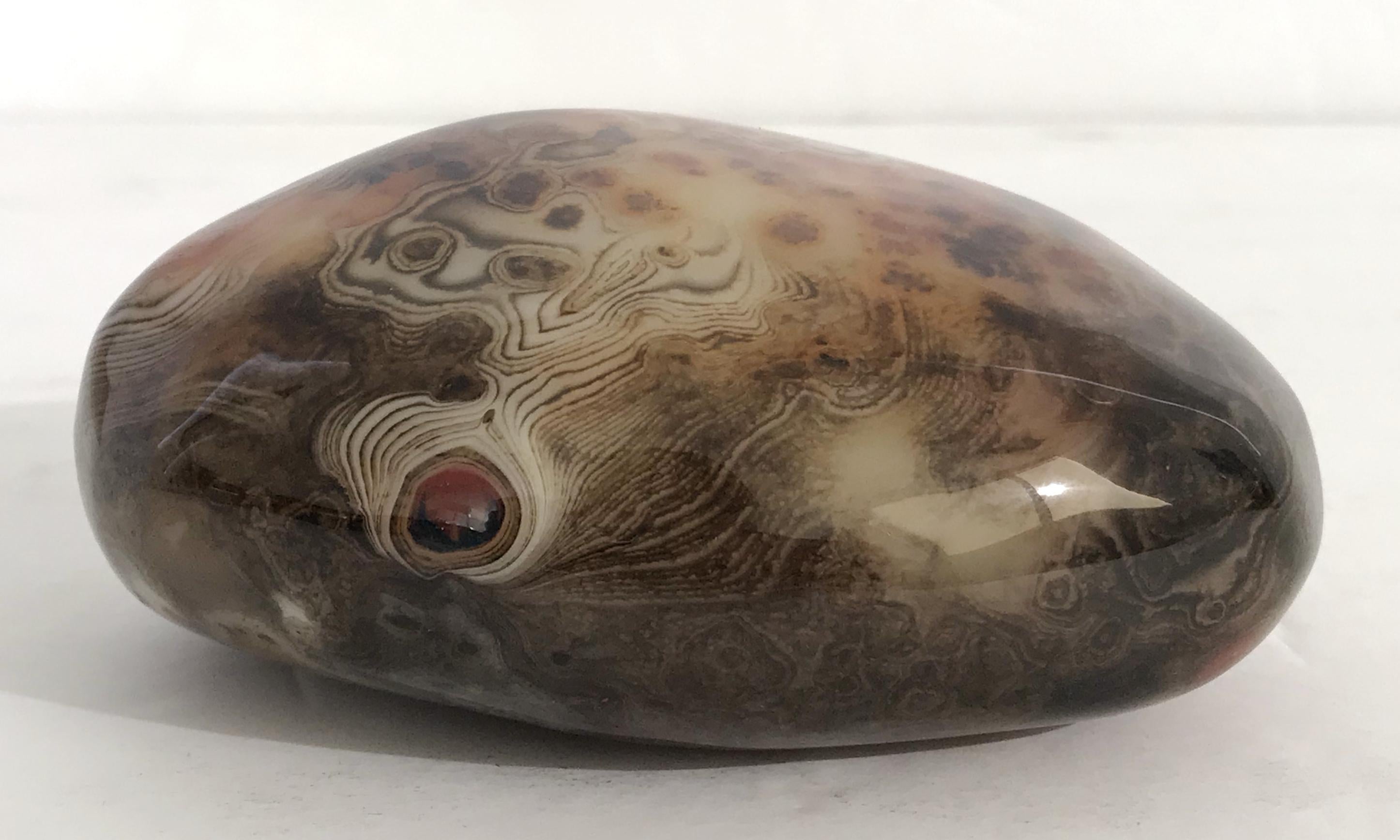 Hand polished agate onyx stone paperweight in black, brown, and red intricate layered patterns
Measures: length 4.5 inches, width 3.5 inches, height 2 inches
1 in stock in Palm Springs ON 50% OFF SALE for $225 !!
This piece makes for a great and