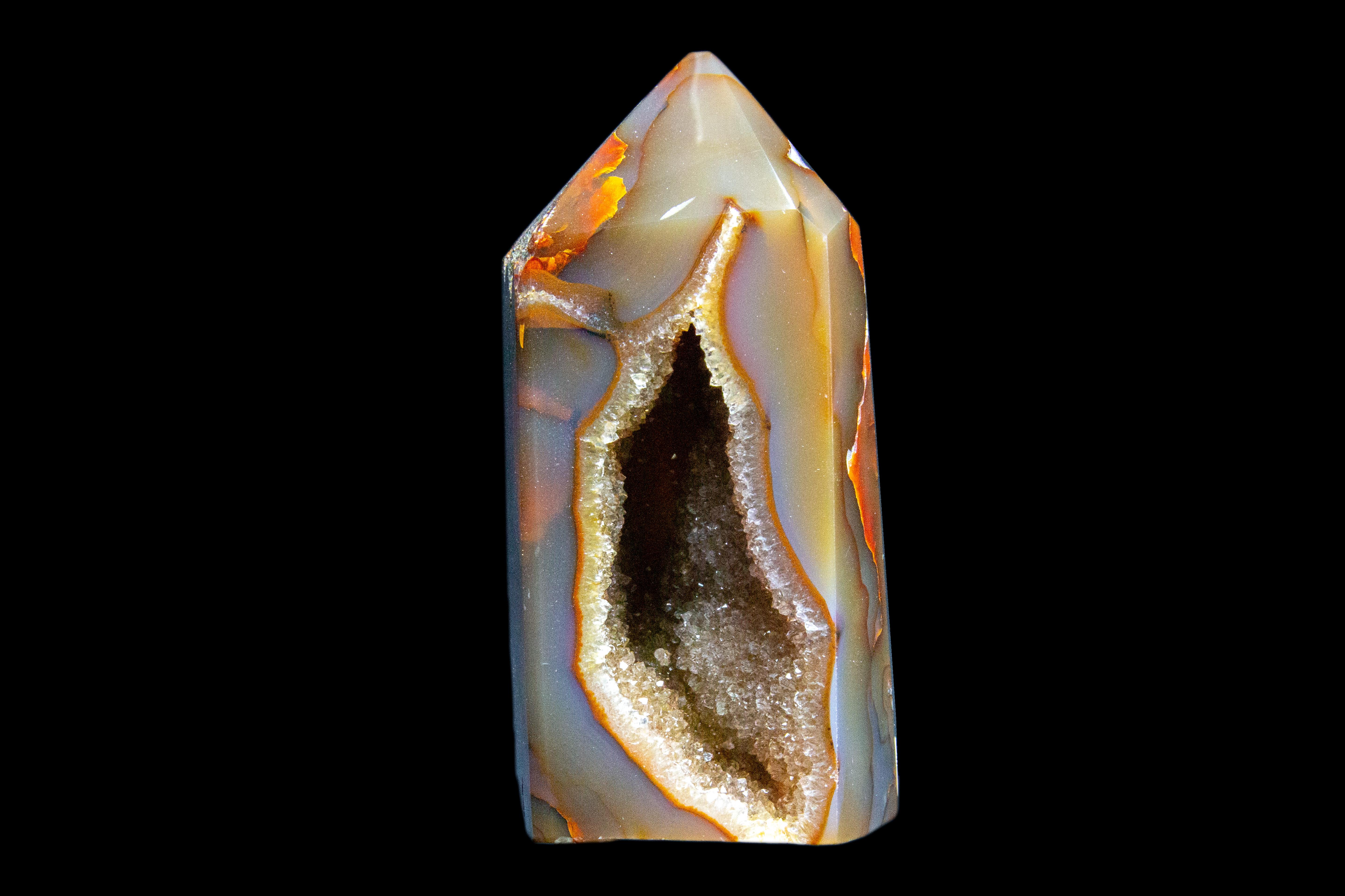 Agate Geode Point: is a geological secondary formation within sedimentary and volcanic rocks. Geodes are hollow, vaguely spherical rocks, in which masses of mineral matter (which may include crystals) are secluded. The crystals are formed by the