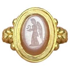 Agate Roman Intaglio 1st-2nd cent.AD 18kt Gold Ring depicting Nike with Snake