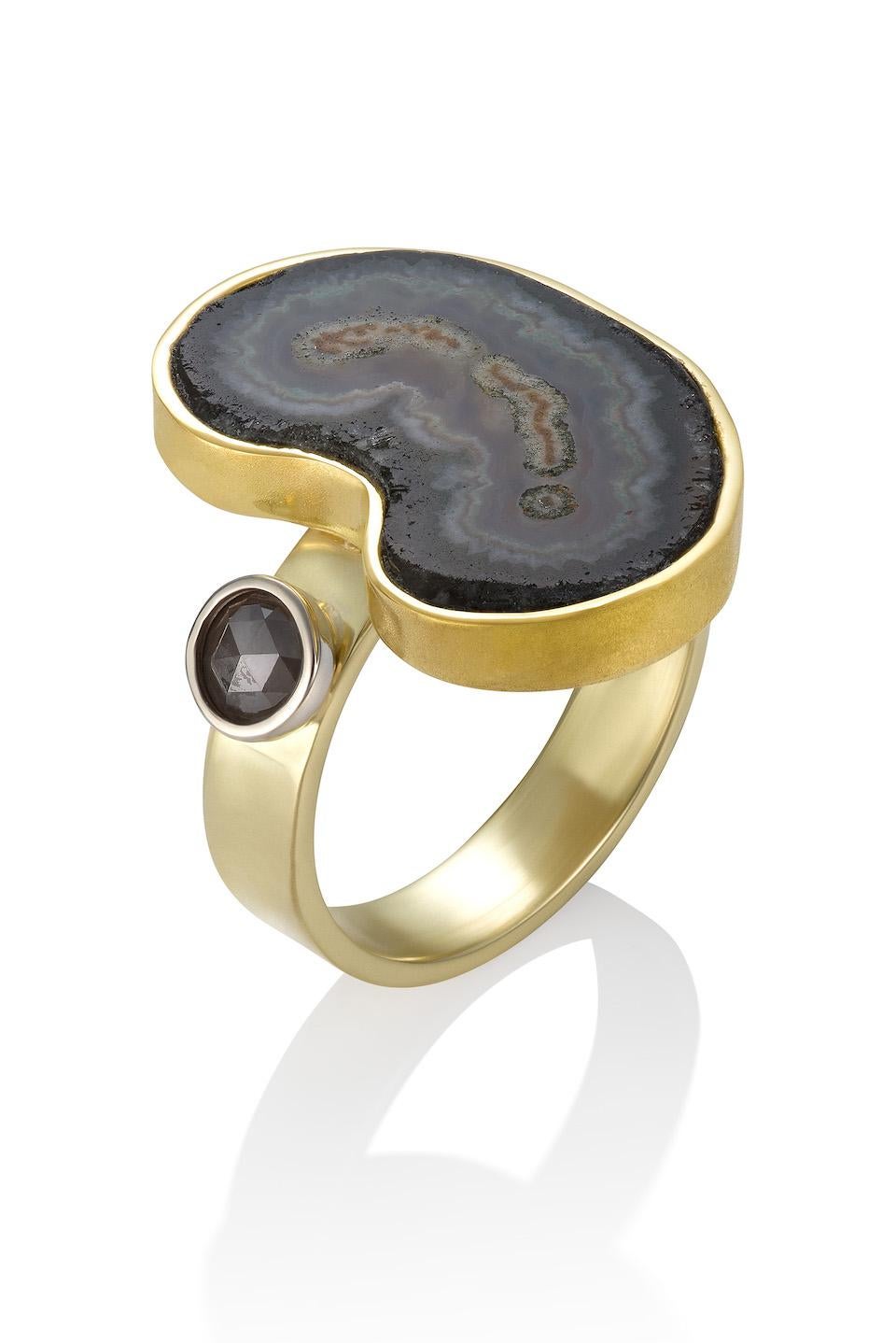 Agate slice combined with a rose cut gray diamond, 0.39 CTW. is a one-of-a-kind statement ring. The multi colored Agate slice is reflected in the multi colored gold colors chosen to creating this one-of-a-kind ring. 18K bright yellow gold for the