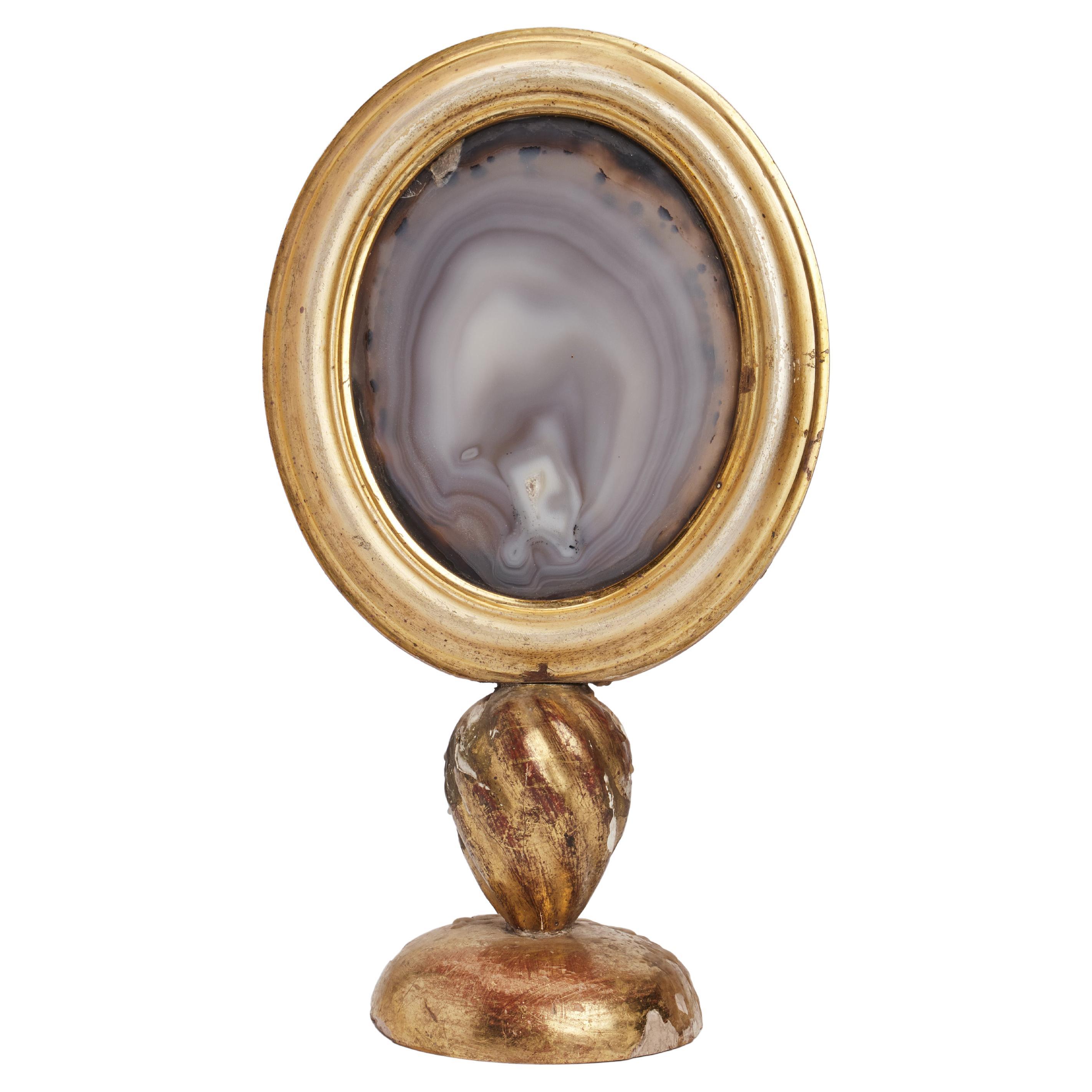 Agate specimen, mounted over a guilt wood base with candle holder, Italy 1880. For Sale