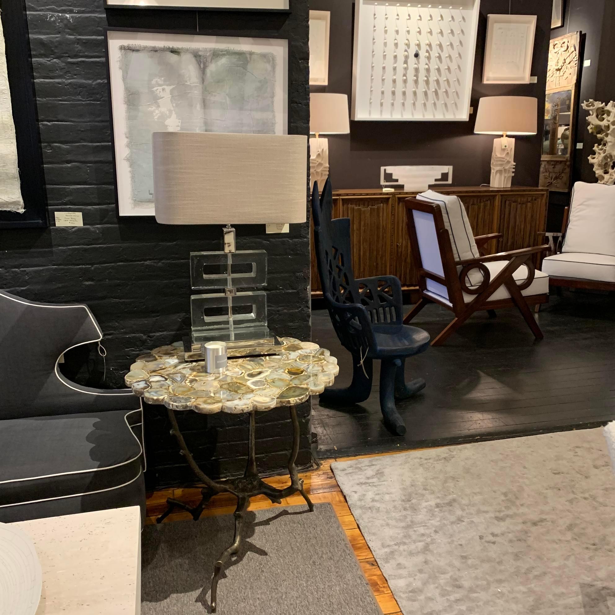 Contemporary Belgian side table.
Mixed light agate top, branch legs in antique brass plating.


