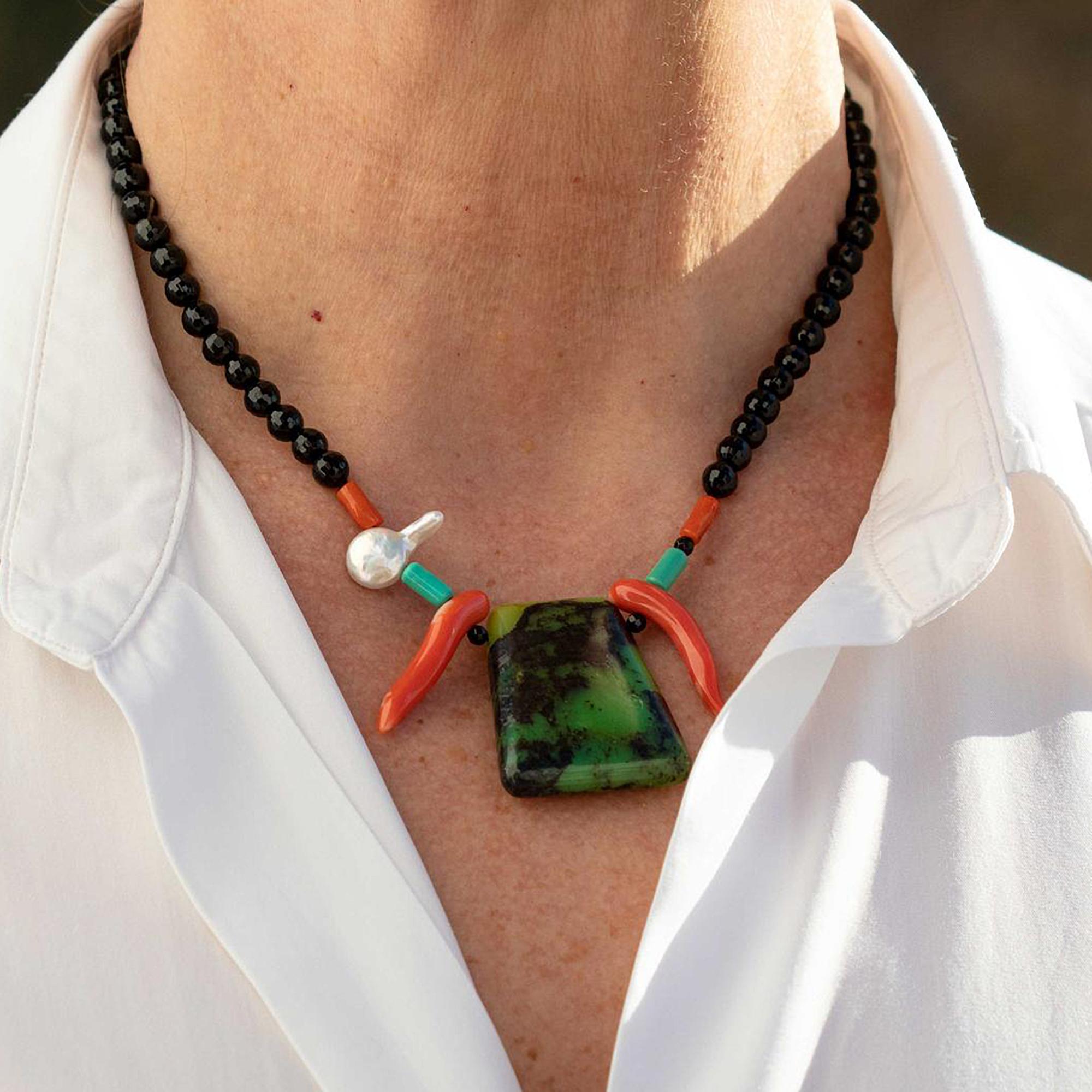A unique design made with black Agate, Turquoise, Coral and a central pendant of Chrysoprase. Handmade in Italy with fine precious stones, ethical and natural. Fits with elegant outfits as well as for a casual look. Enjoy the brightness of Natural