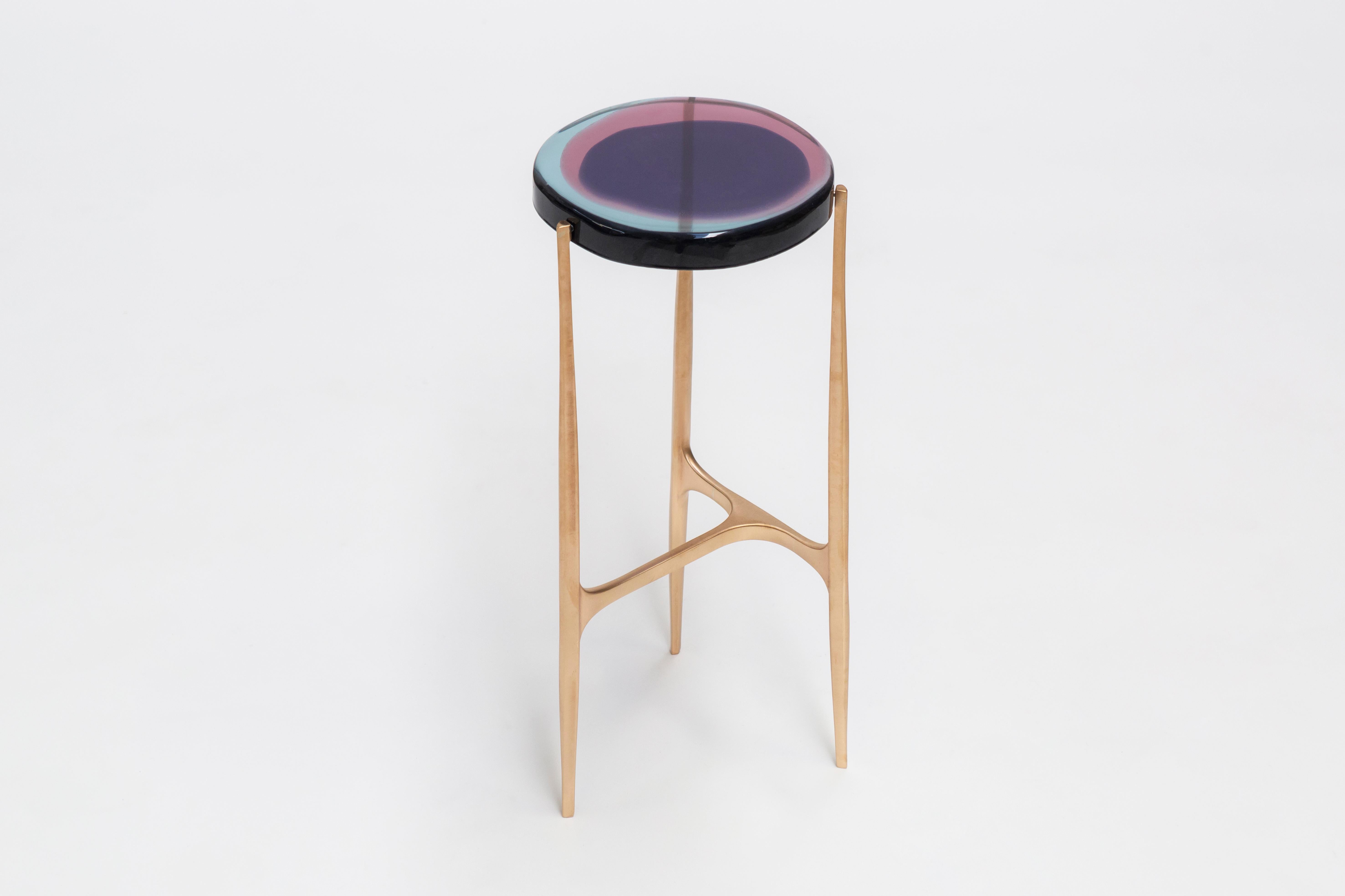 Agatha coffee table by Draga & Aurel
Dimensions: W 24 x D 24 x H 56
Top Ø 24 cm
Materials: Resin and bronze

The Agatha coffee tables are featured by irregular circular tops of transparent and
colorful resin sit on a bronze frame with a