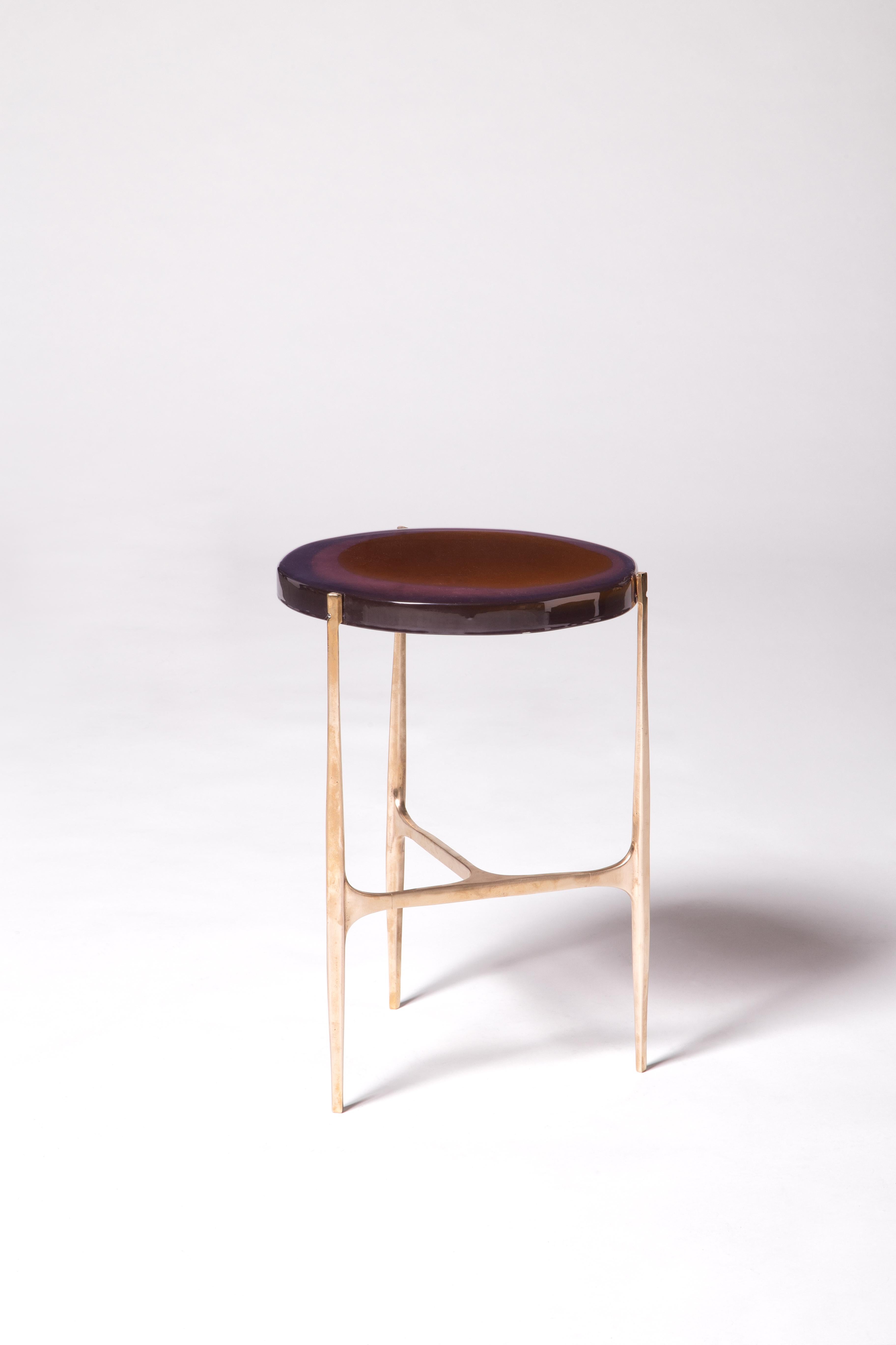 Agatha coffee table by Draga & Aurel
Dimensions: W 34 x D 34 x H 50
Top Ø 34 cm
Materials: Resin, bronze

The Agatha coffee tables are featured by irregular circular tops of transparent and
colorful resin sit on a bronze frame with a staggered